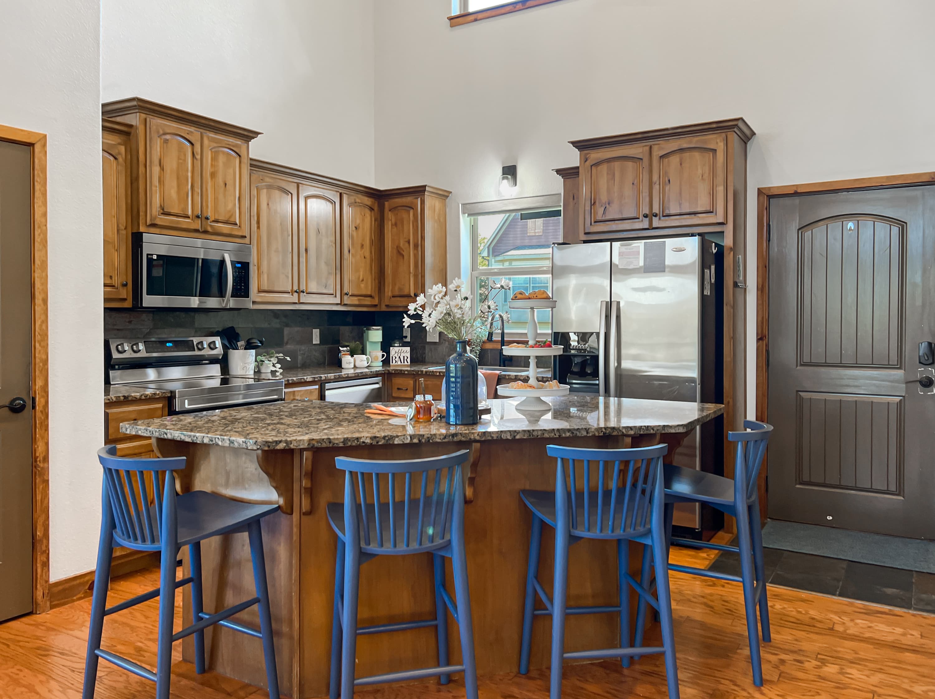 Cook for a crowd in the fully stocked kitchen with a glass-top stove and air-fry oven