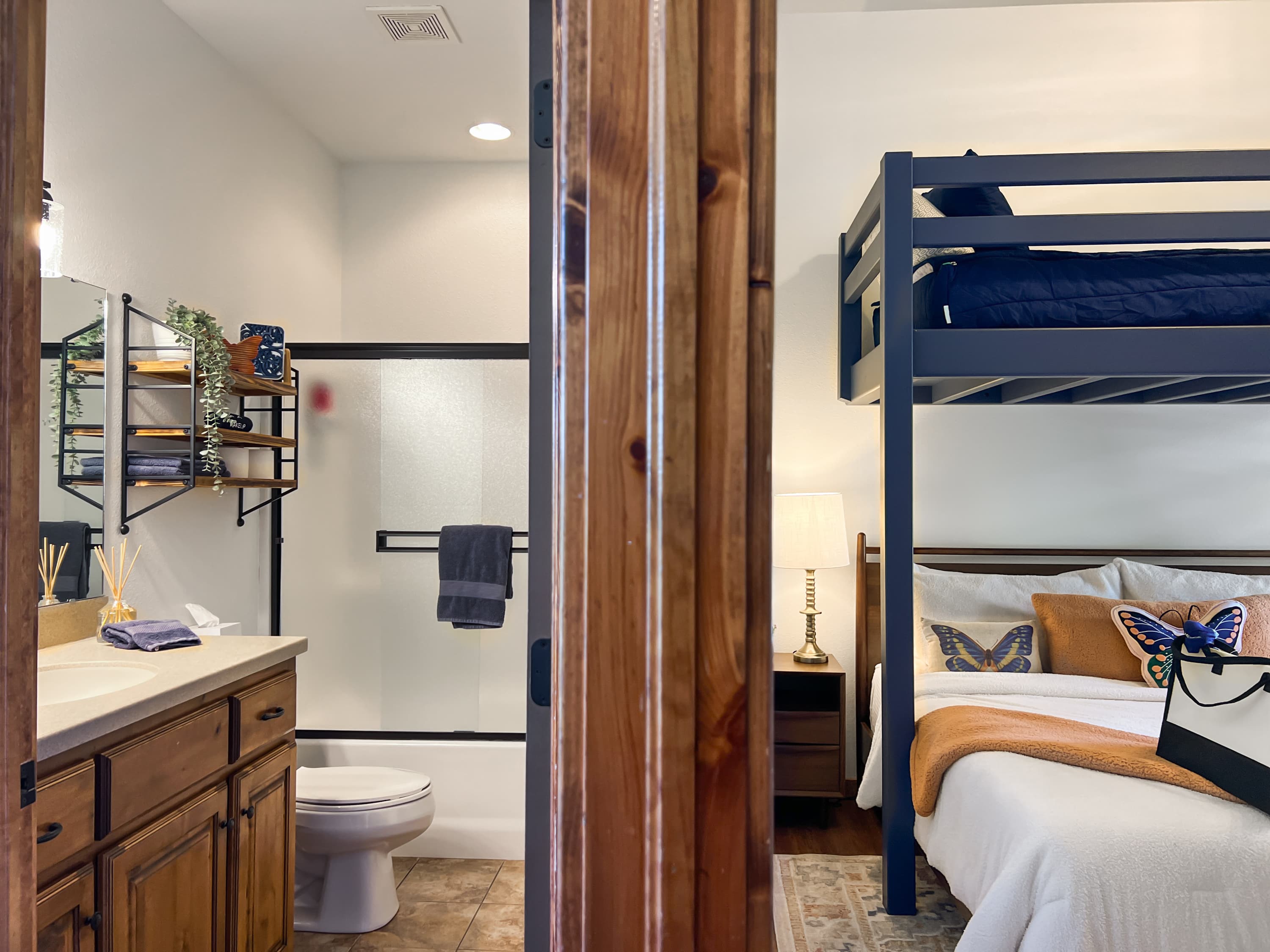 Modern finishes meet rustic warmth in the main-level master bath