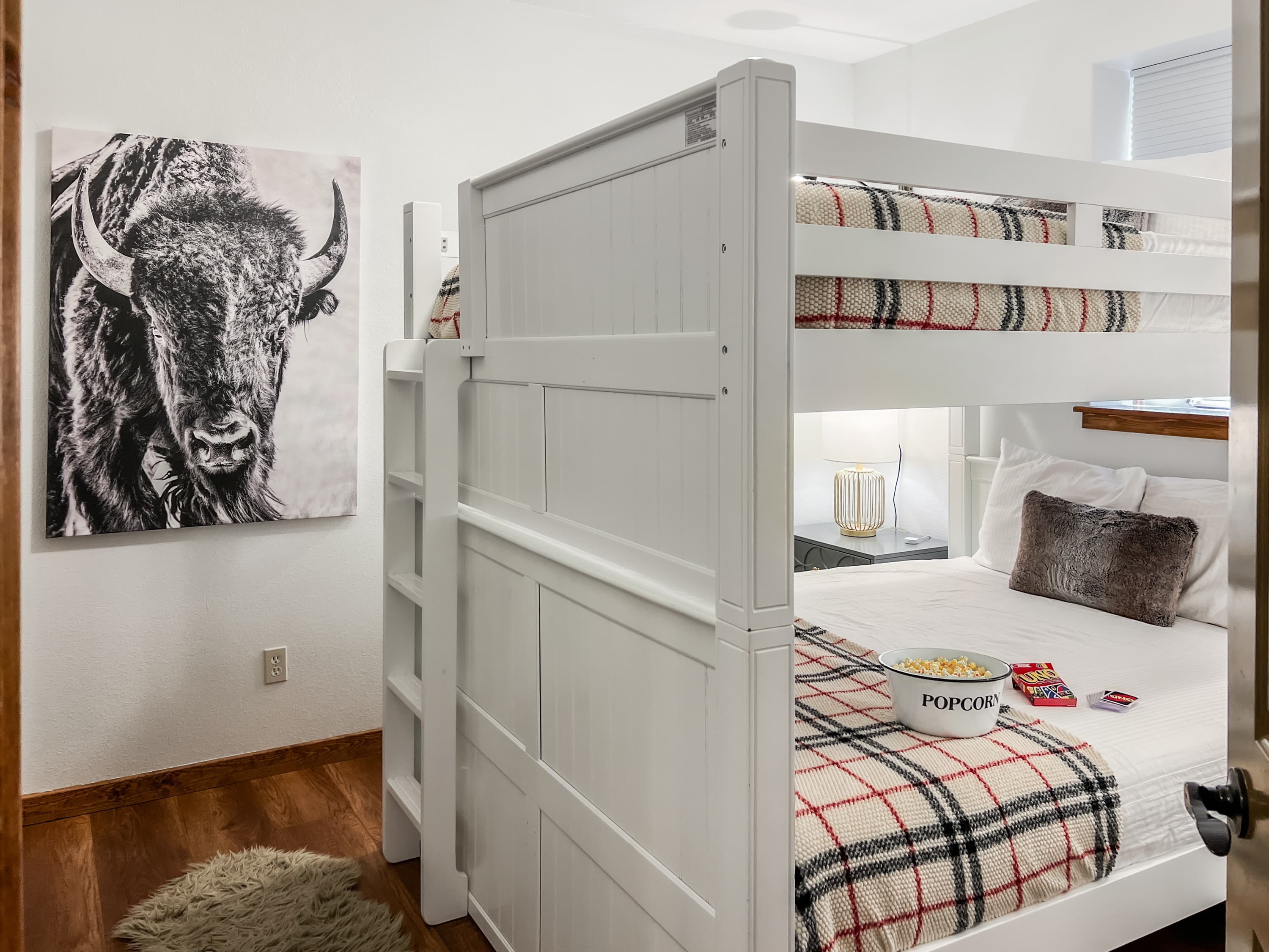 The sturdy queen-over-queen bunk bed fits the whole crowd comfortably for a great night's sleep