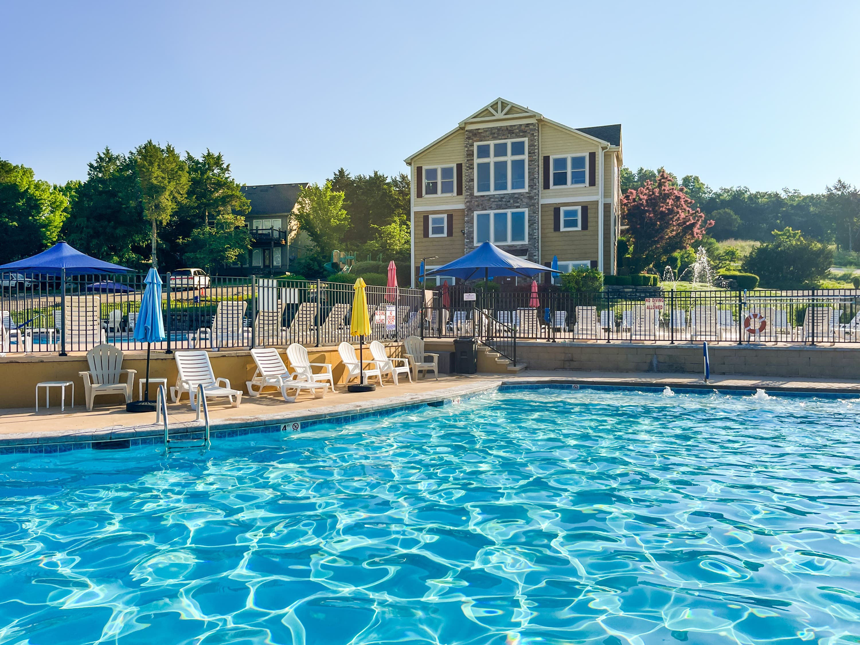 The Branson Canyon resort pool is the summer centerpiece — two levels, a slide, and a splash pad