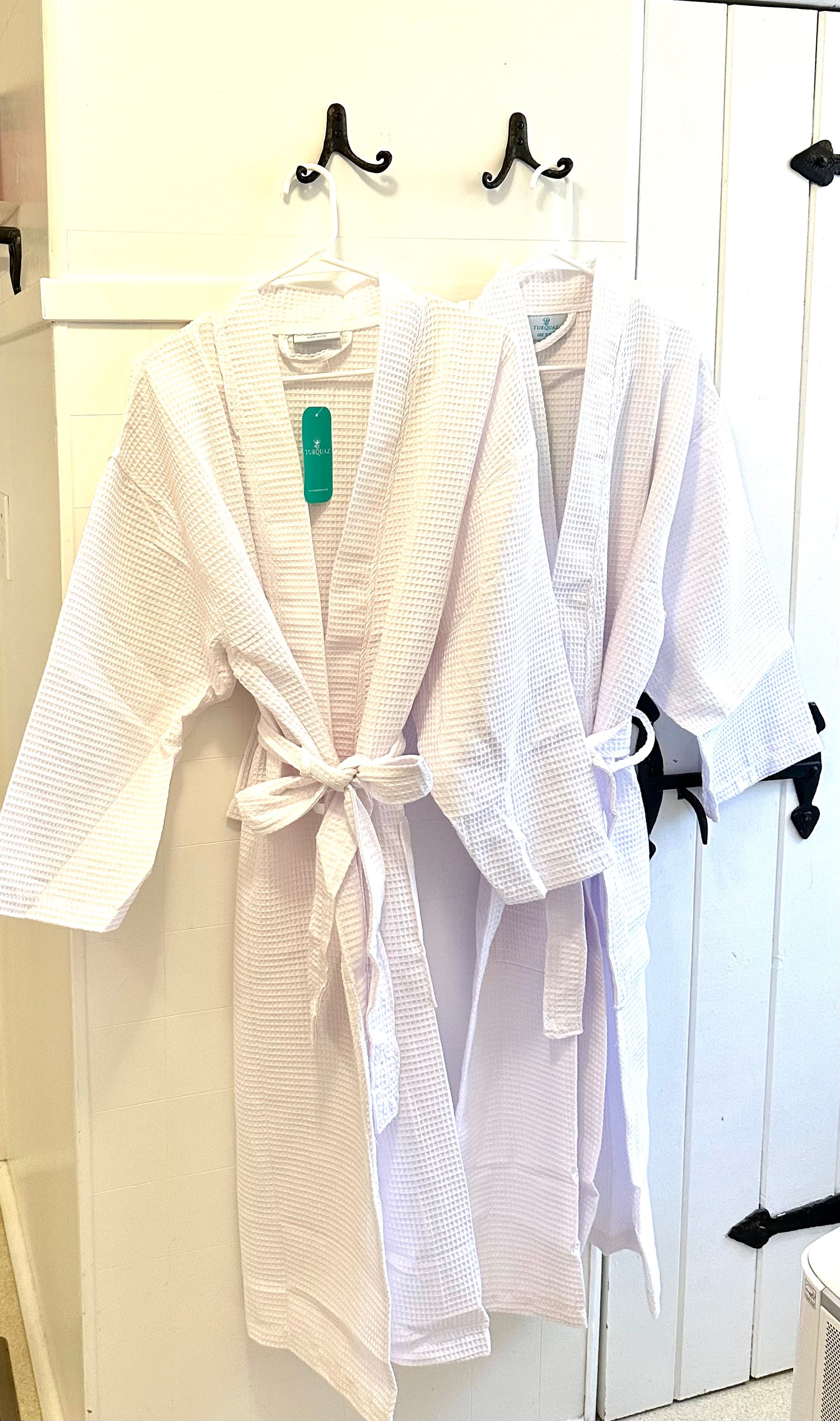 Monogramed robes provided for your comfort and convenience