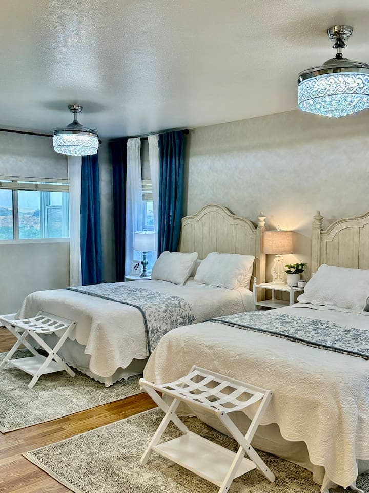 Serenity and Comfort Awaits in our Queen Suite! Layers of 100% cotton bedding and stunning views await you.