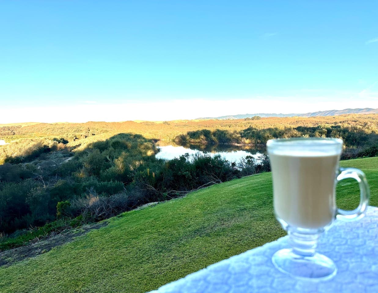 Morning coffee on the porch with a lake and dunes view?  Yes, Please! Your worries will melt away here.
