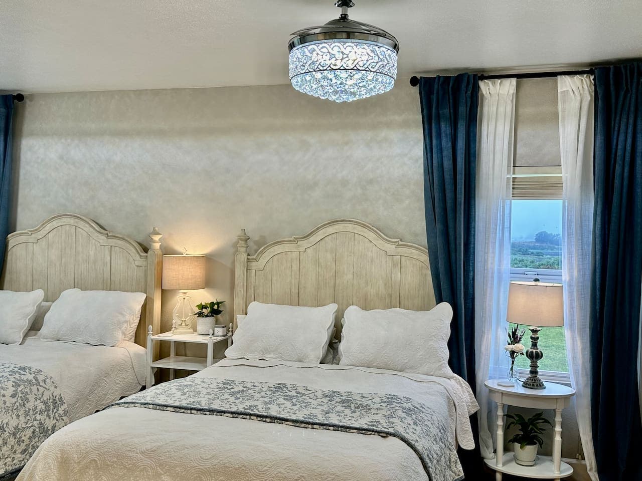 Lake views from every window in this spacious and beautiful Queen Suite. Attention to detail for every vignette.  Sleep in comfort with new Queen mattresses and all new bedding throughout.  