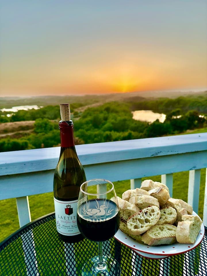 Wine and appetizers while taking in the sunsets from our porch is sublime! Make your magic happen here!
