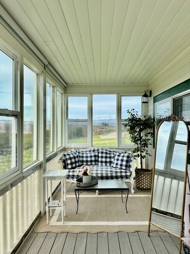 Breathtaking views from the enclosed sun porch.