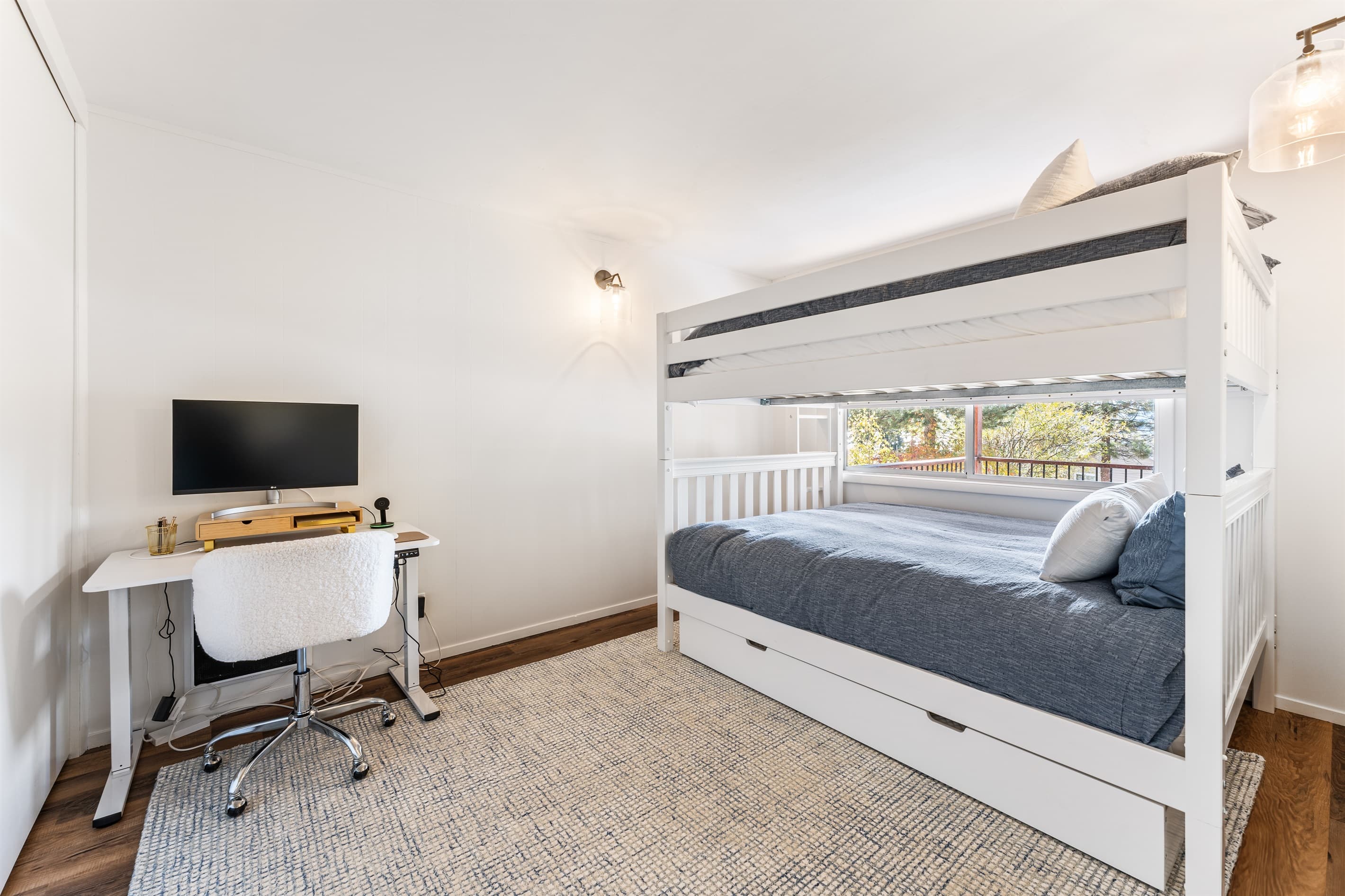 Bunk Room - Located on the first floor with a queen over queen bunk bed and full size trundle bed