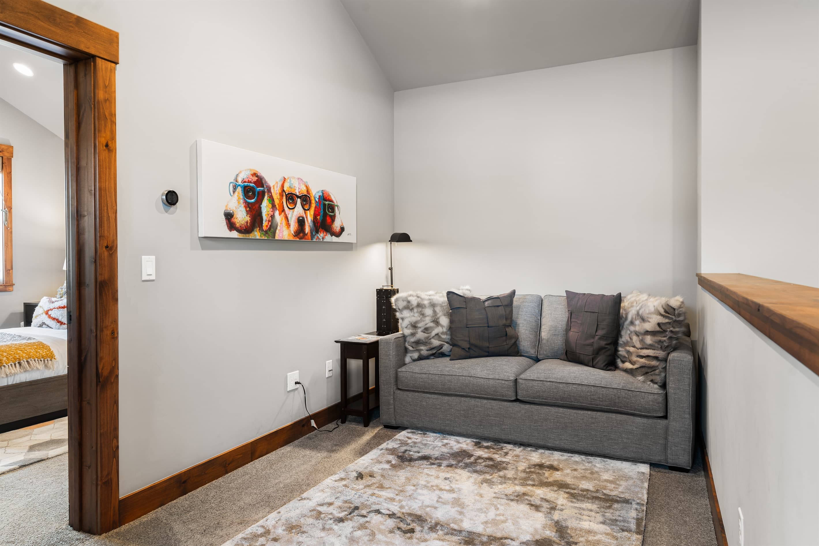 Upstairs landing area with a pull out sofa.