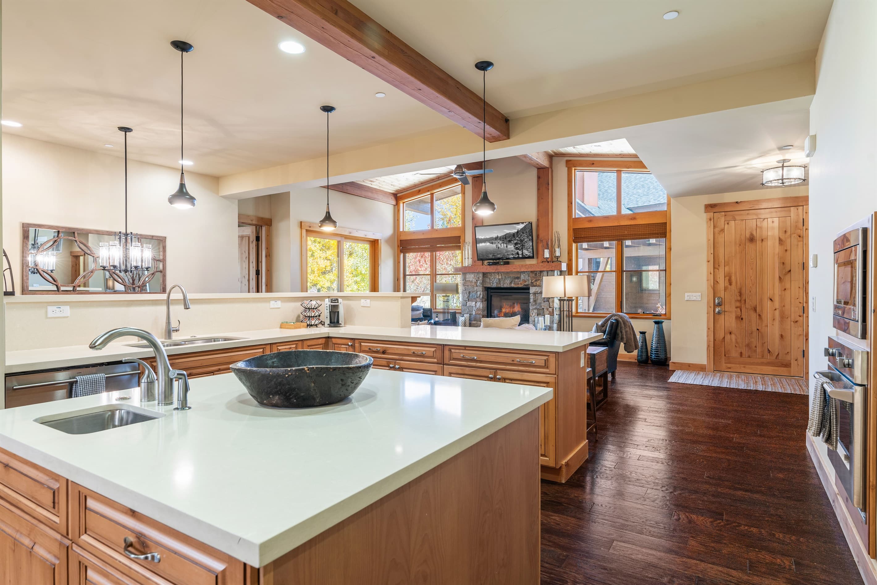 A chef’s dream kitchen with sleek countertops, premium appliances, and a spacious island ideal for cooking, gathering, and casual meals. Countertop seating for 3 people.