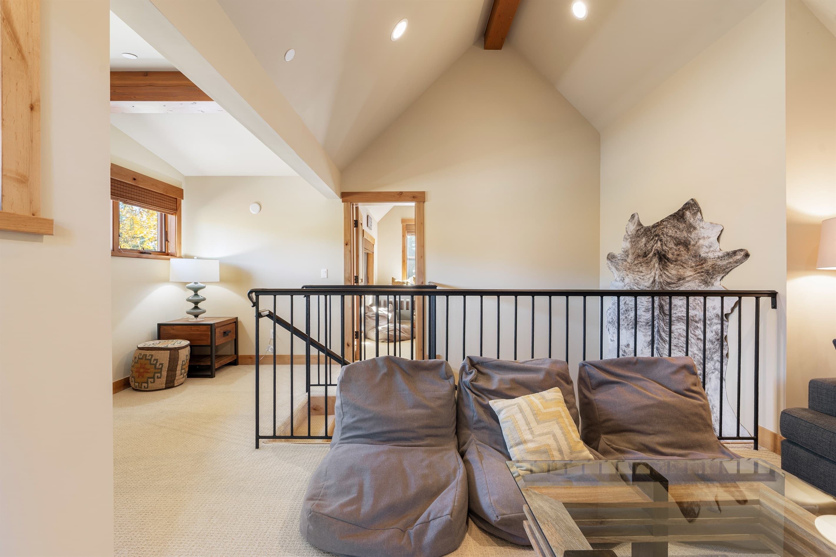 Unwind in the upstairs loft, complete with a TV, bean bag chairs, and a pullout couch for extra comfort and flexibility.