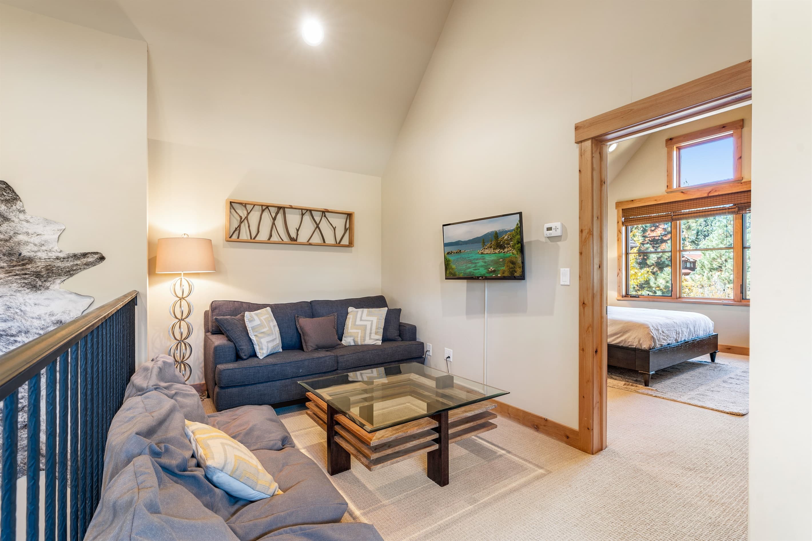 Unwind in the upstairs loft, complete with a TV, bean bag chairs, and a pullout couch for extra comfort and flexibility.