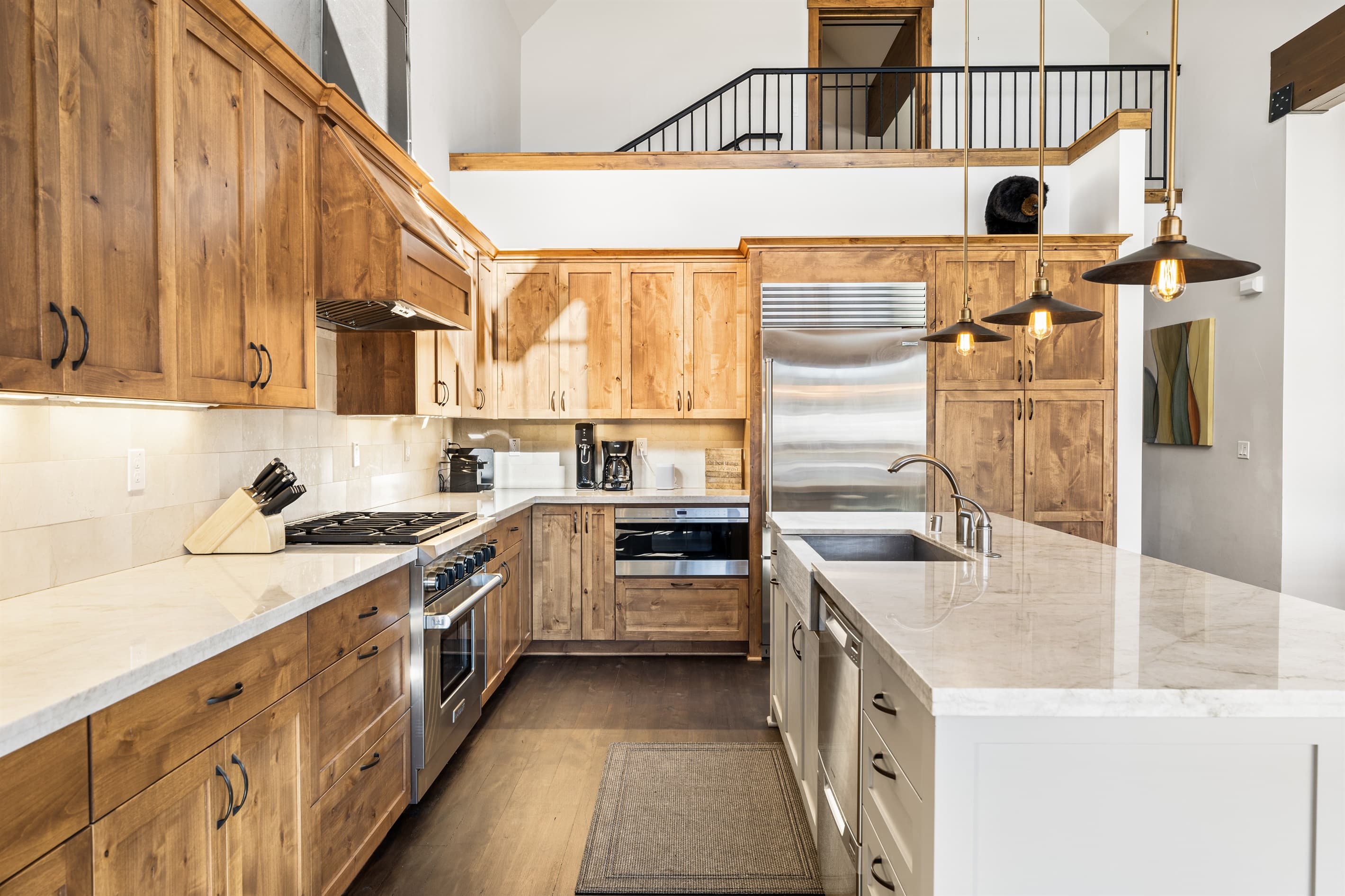 A chef's delight! The gourmet kitchen features sleek countertops, state-of-the-art appliances, and an island perfect for meal prep or casual dining.