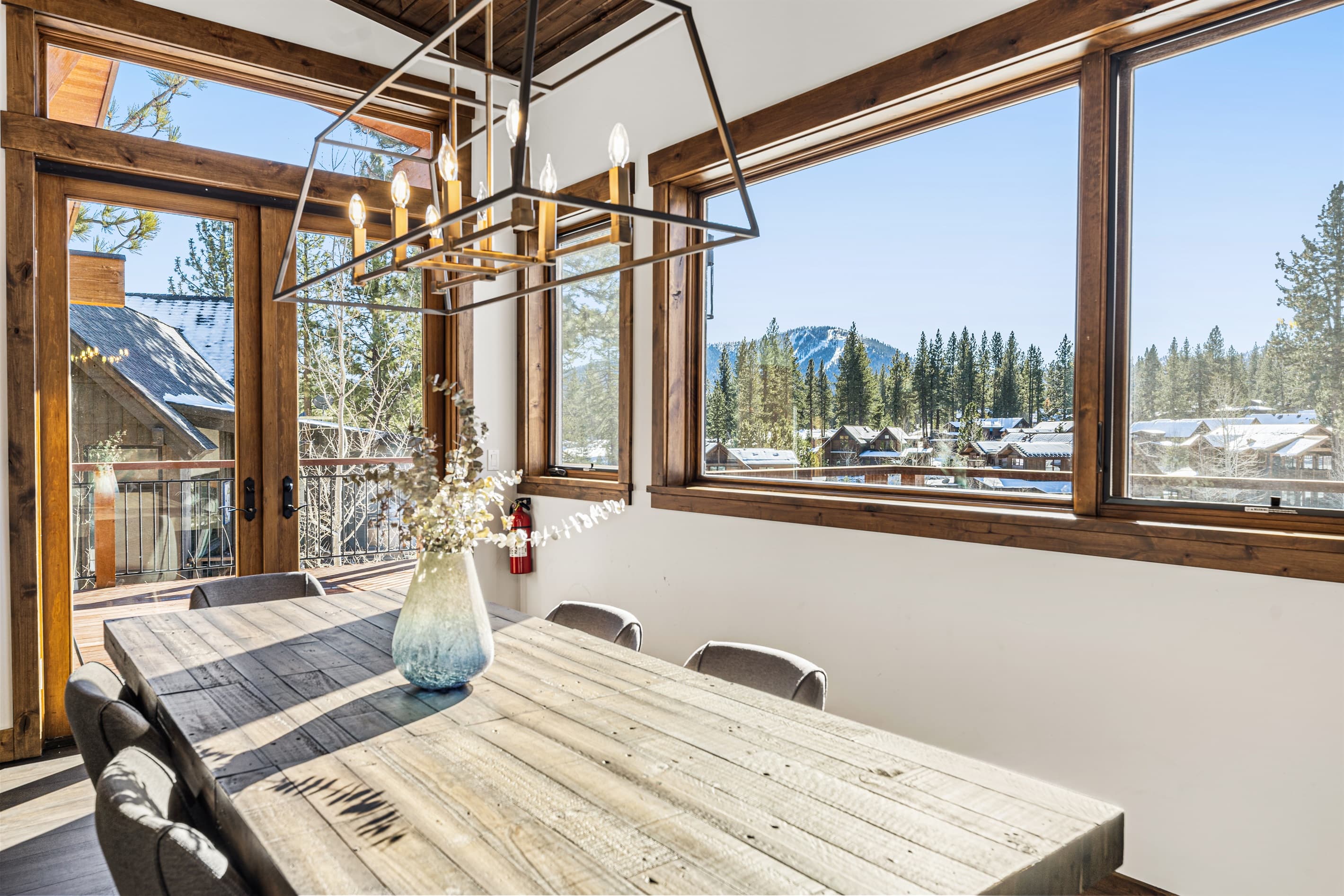 The dining table seats up 10 people and offers stunning views of the 7th green and Lookout Mountain.