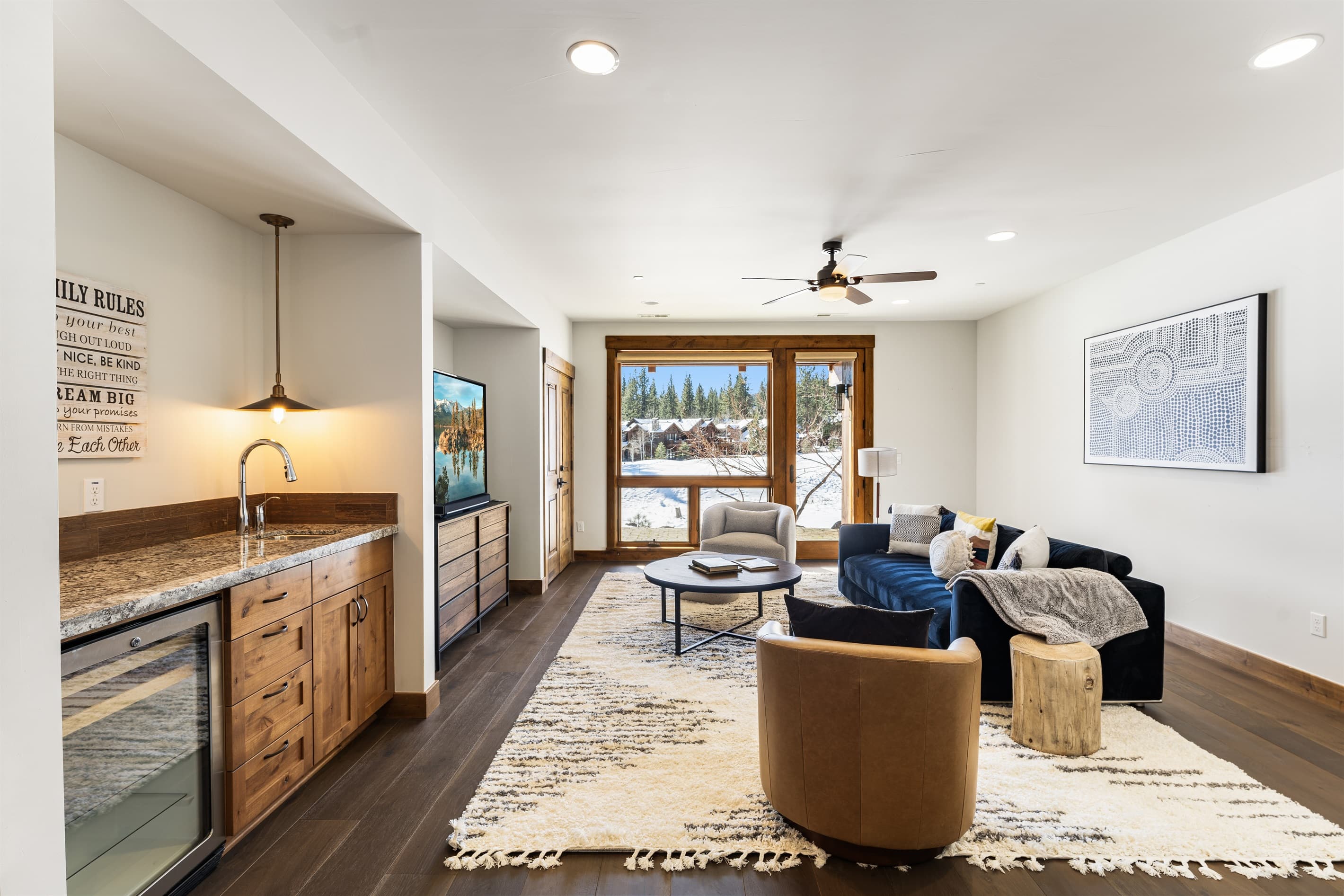 Enjoy movie nights on the 70" Smart TV or game time in this cozy entertainment area, designed for relaxation and fun with friends and family.