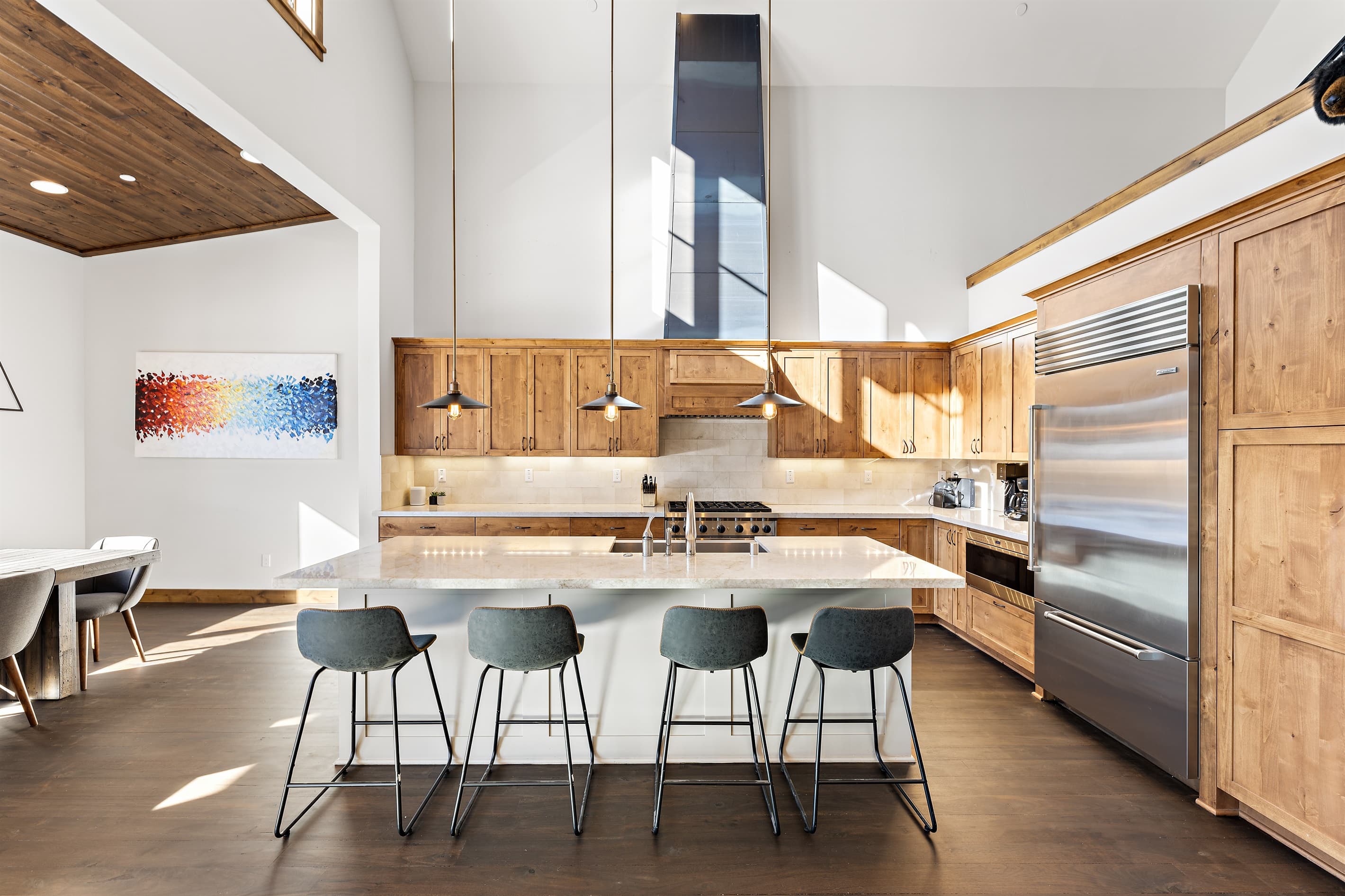 A chef's delight! The gourmet kitchen features sleek countertops, state-of-the-art appliances, and an island perfect for meal prep or casual dining.