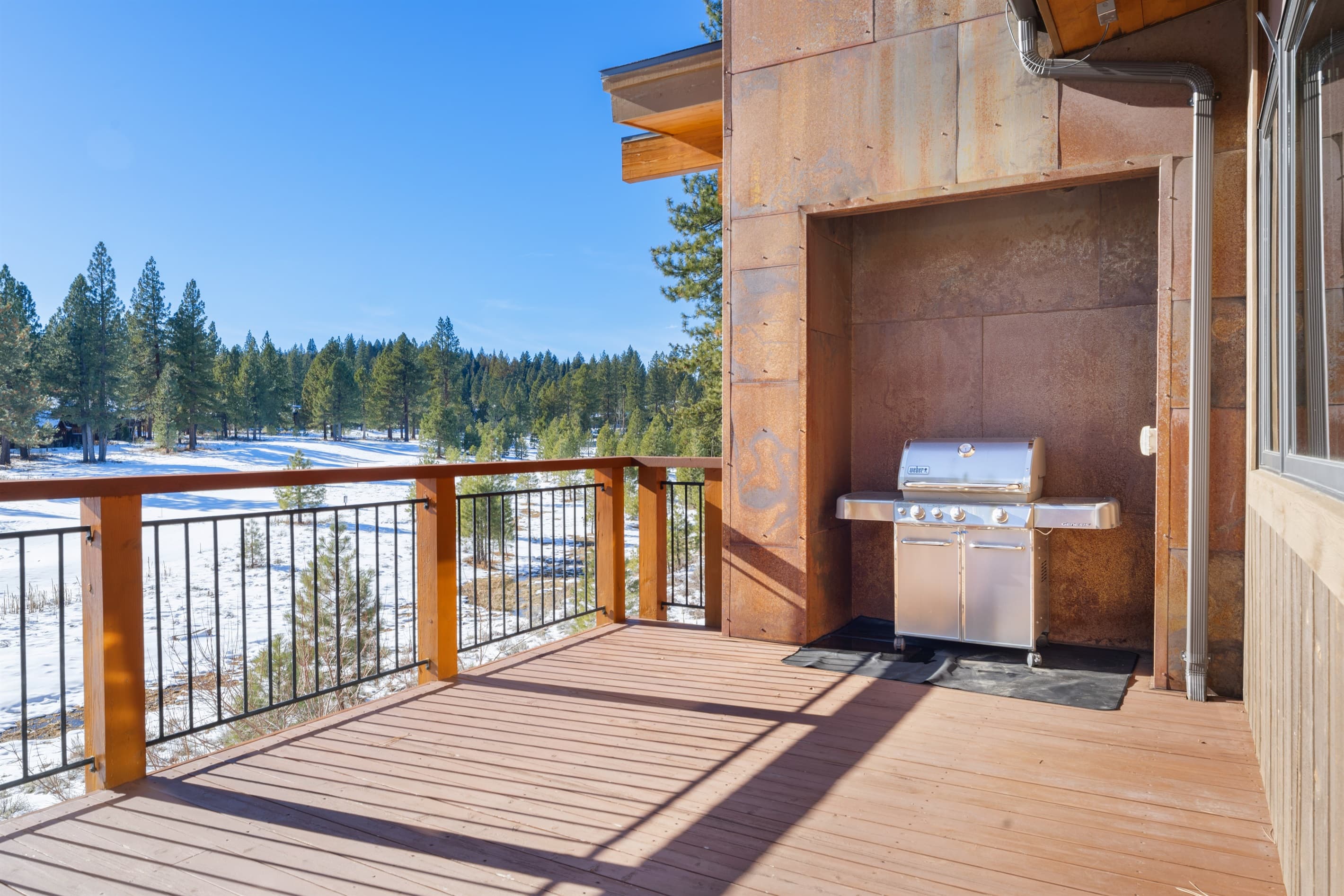 Capture stunning sunsets from the patio as the sky transforms with hues of orange and pink over the mountains. BBQ grill available for use.