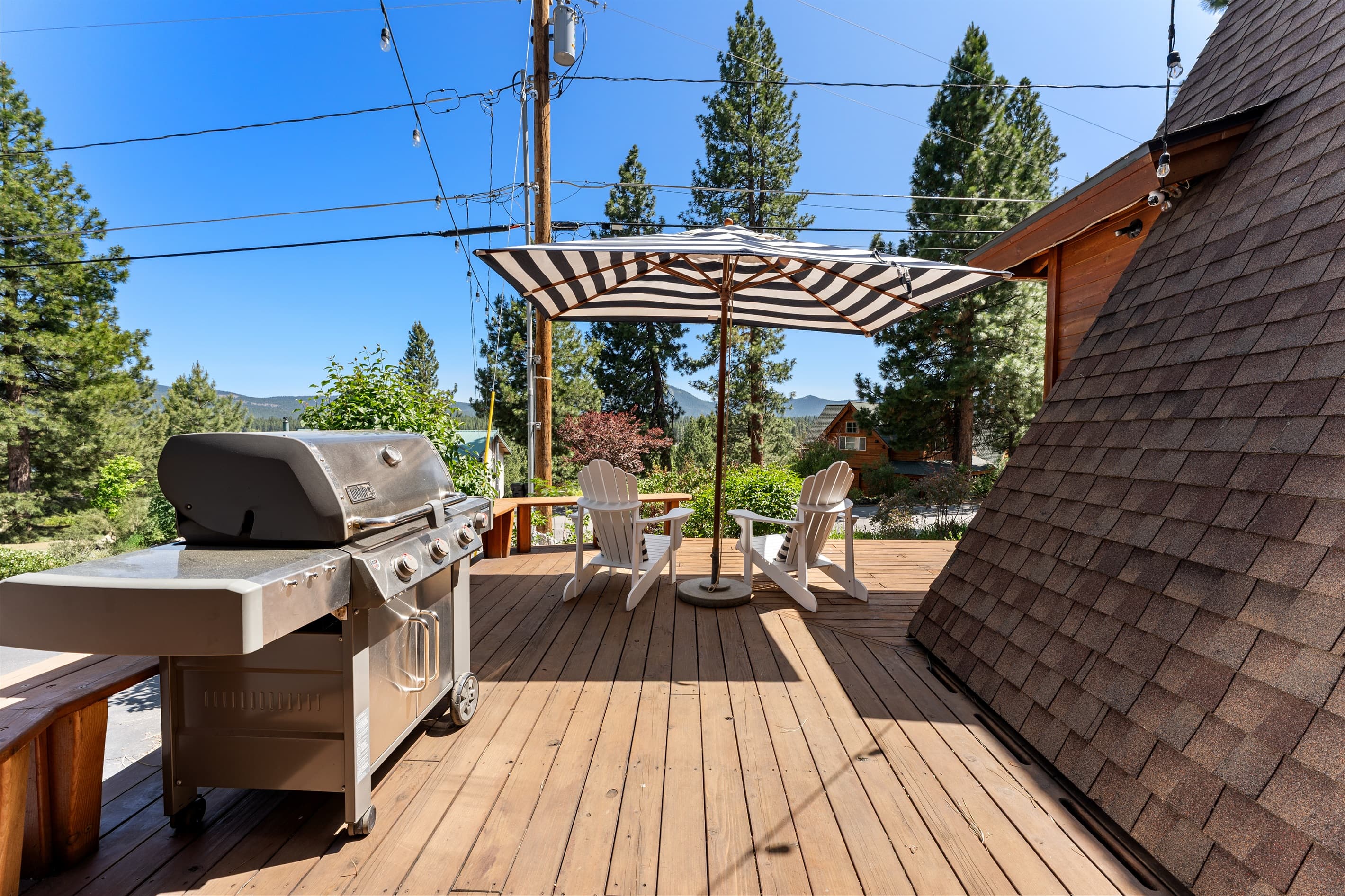 Breathe in the fresh mountain air. Grill, dine, and unwind on the spacious deck surrounded by towering pines with peek views of Northstar. Summer dinners and starry nights await. Please note: patio furniture and grill are available from May - October.