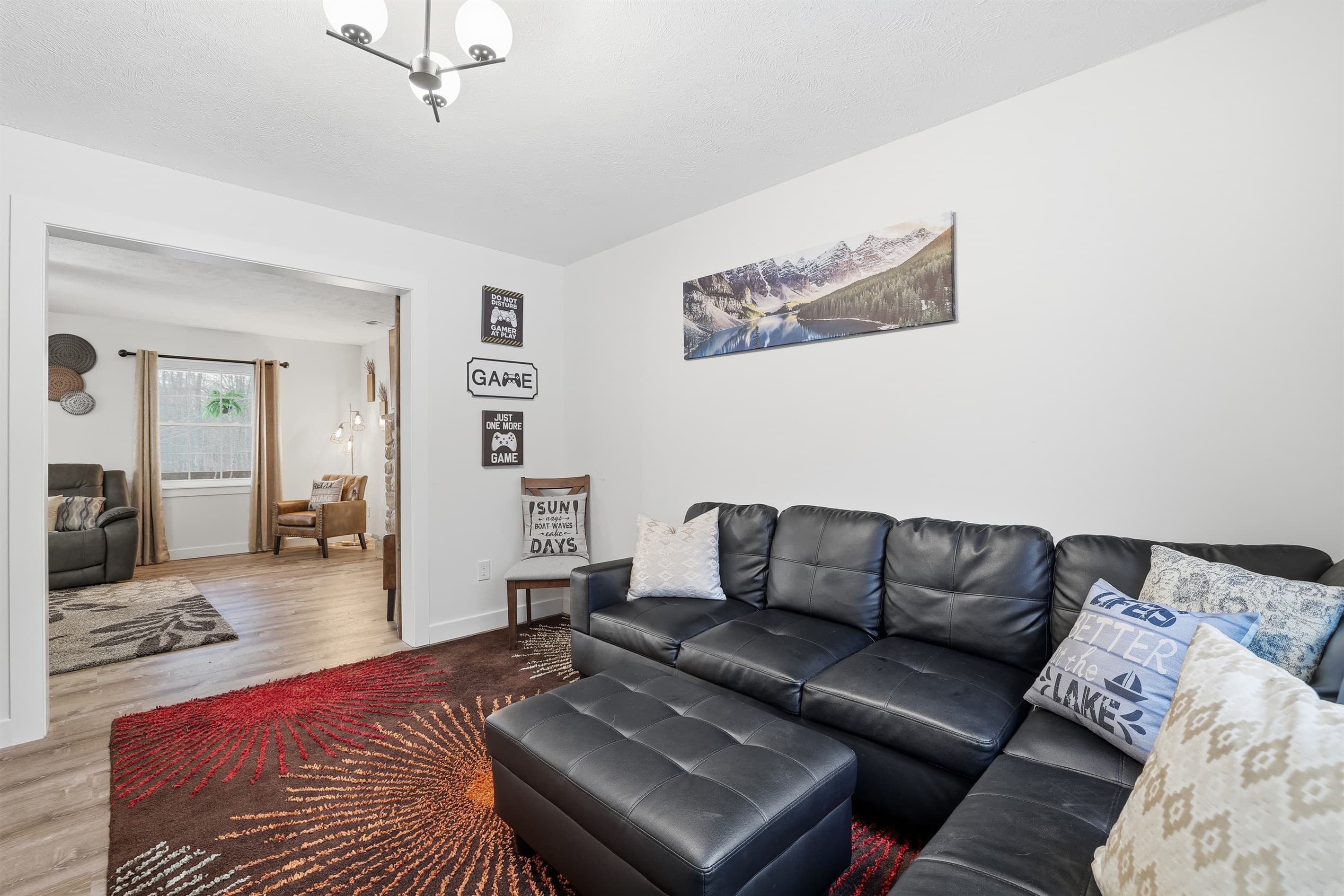 Room with comfy couch and TV