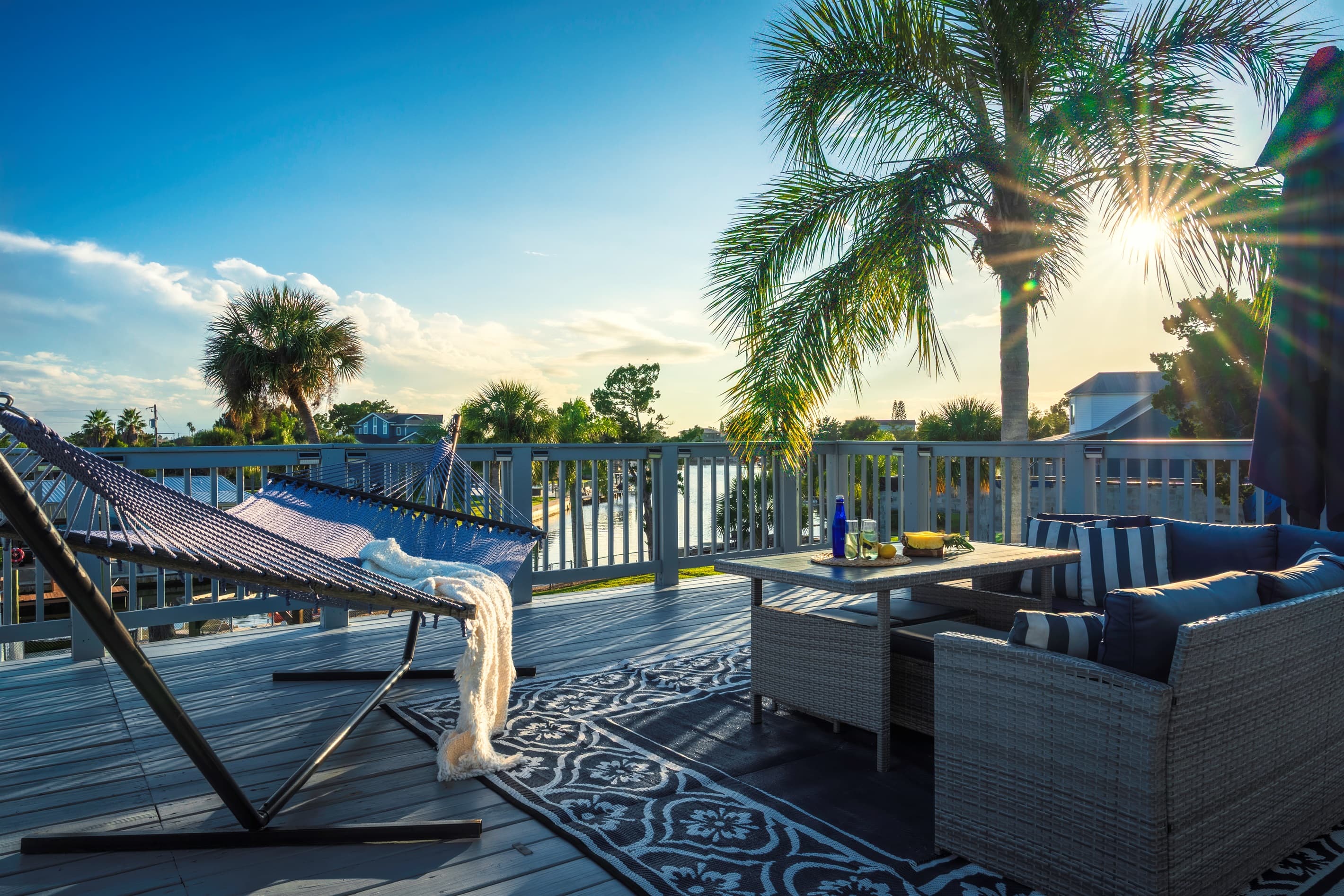 Private upper deck- sunset views, lounge seating & coastal breezes. 
