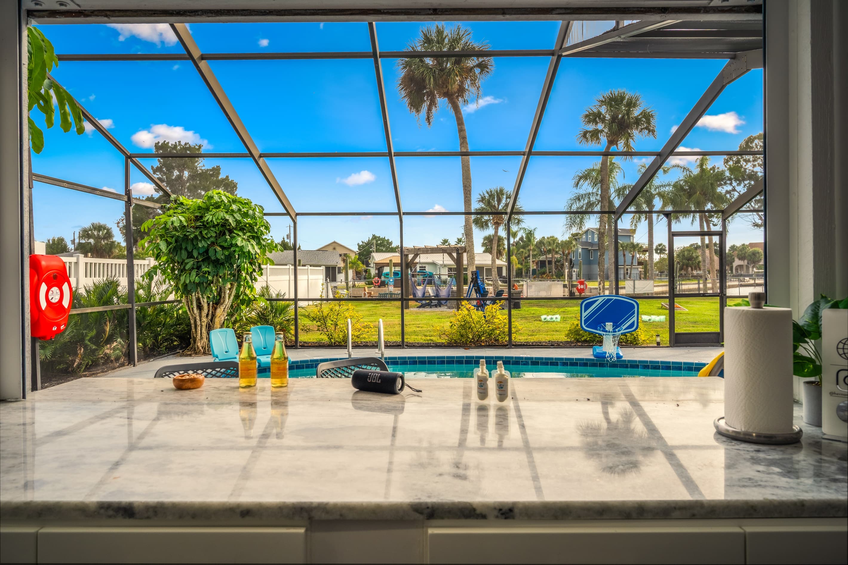 Swim up poolside bar-resort-style convenience at home.