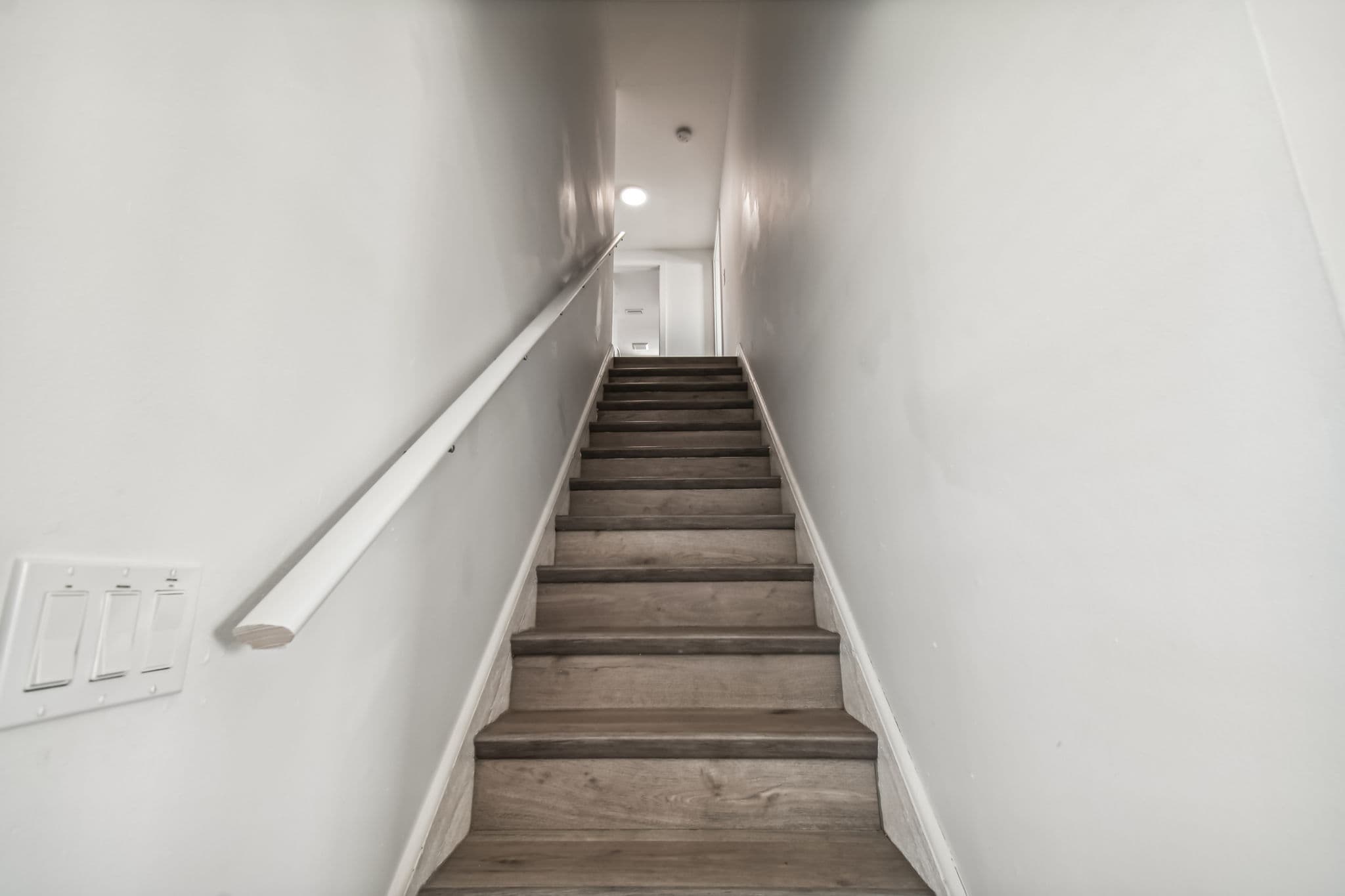 Interior staircase - connecting second and third floors (no elevator).