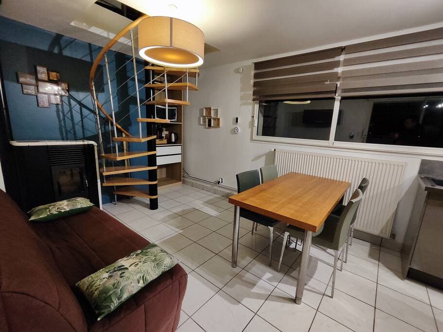 Canapé lit et espace cuisine