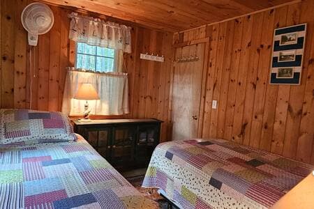 Second bedroom with two twin beds. 