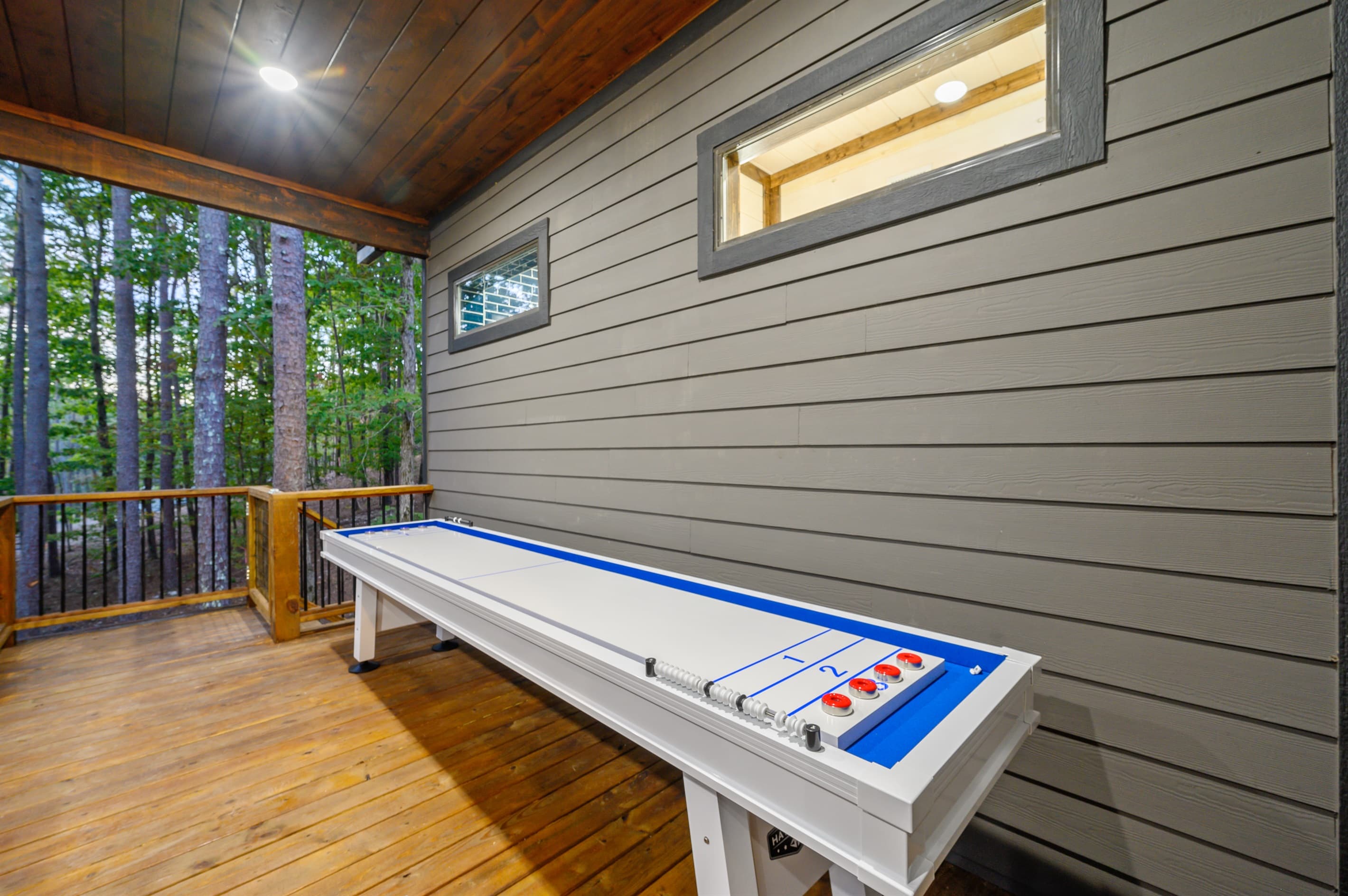Outdoor shuffleboard table on the deck