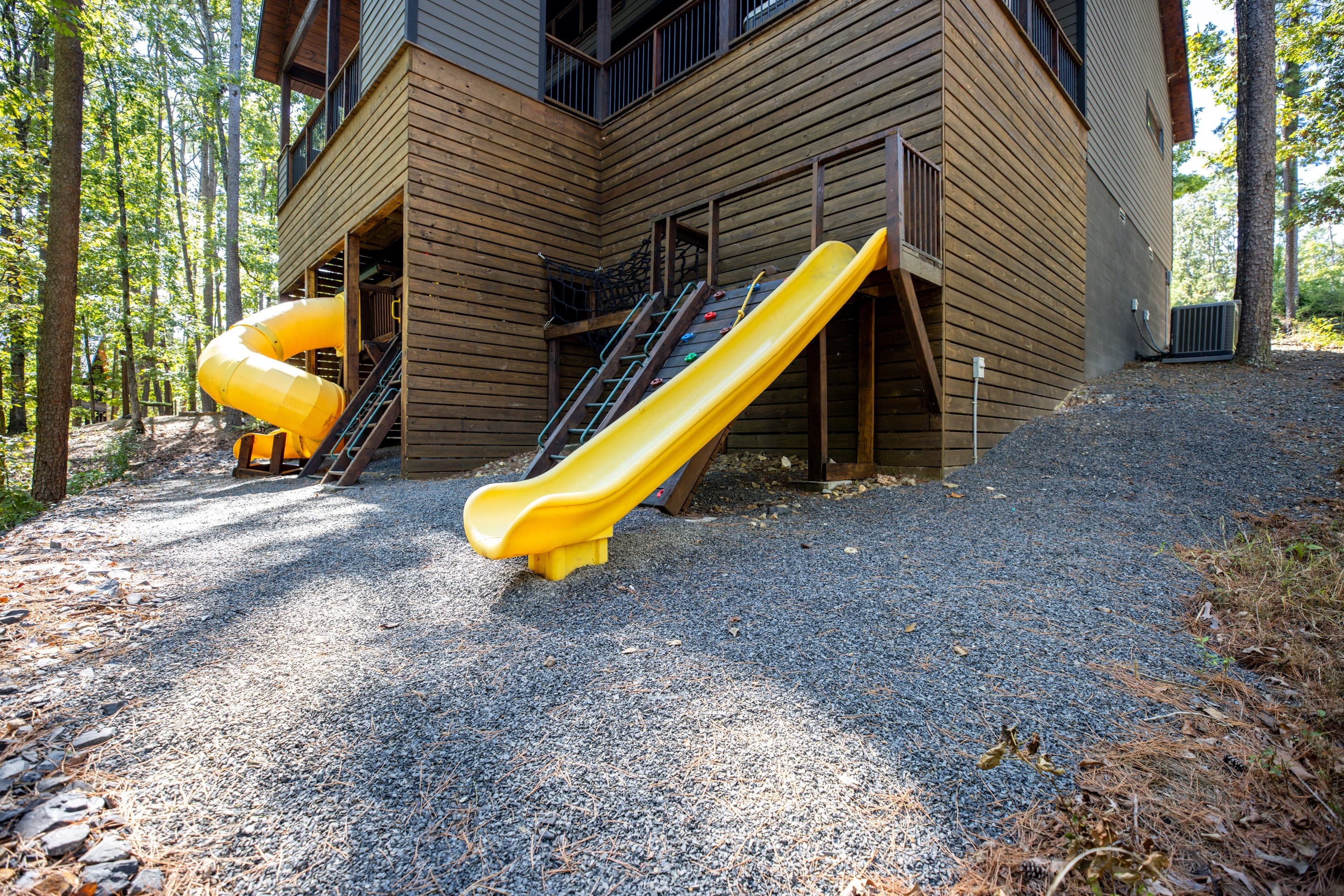 2 Slides and rock climing wall on this playset