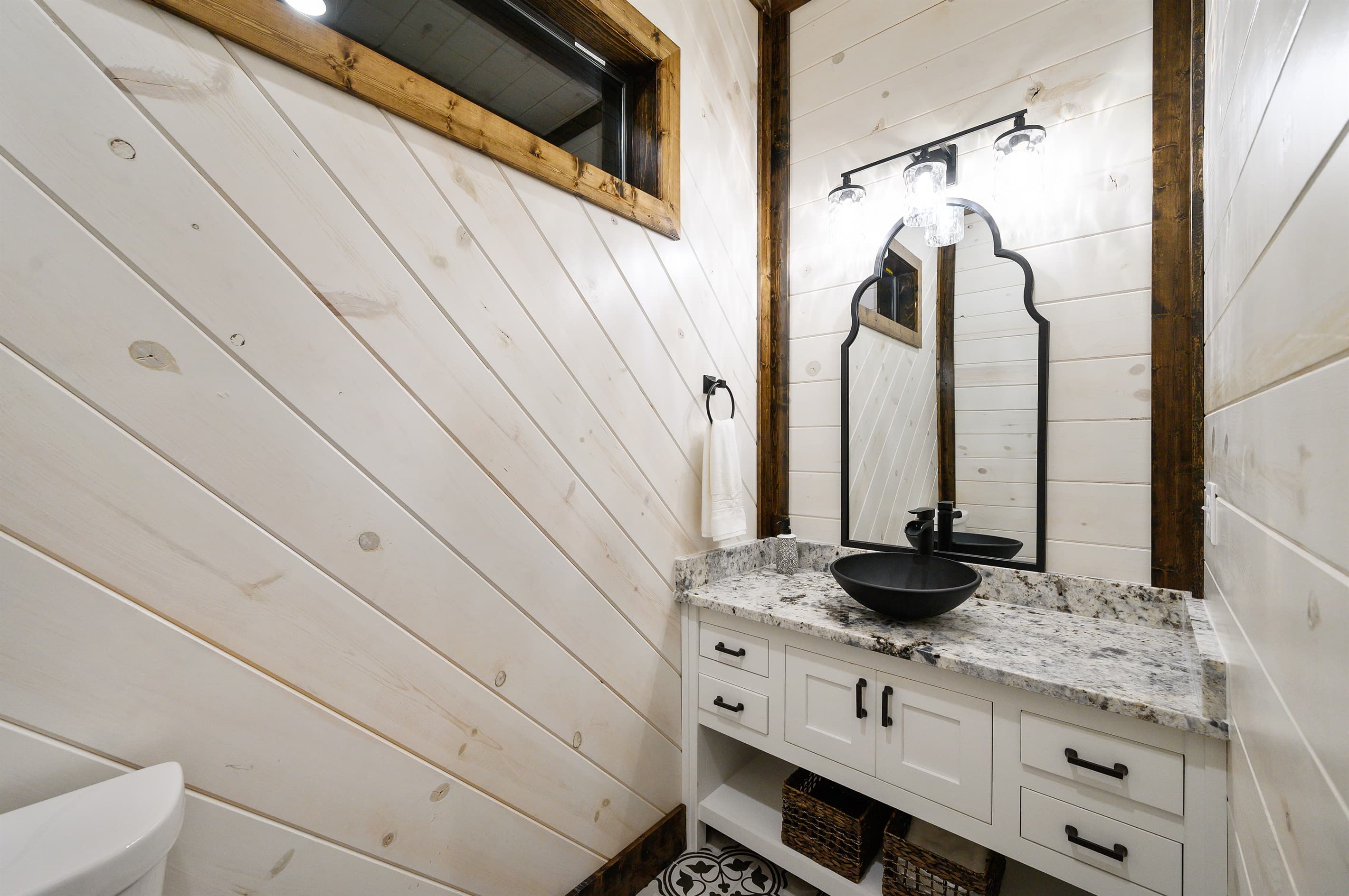 Half bath is conveniently located adjacent to the kitchen