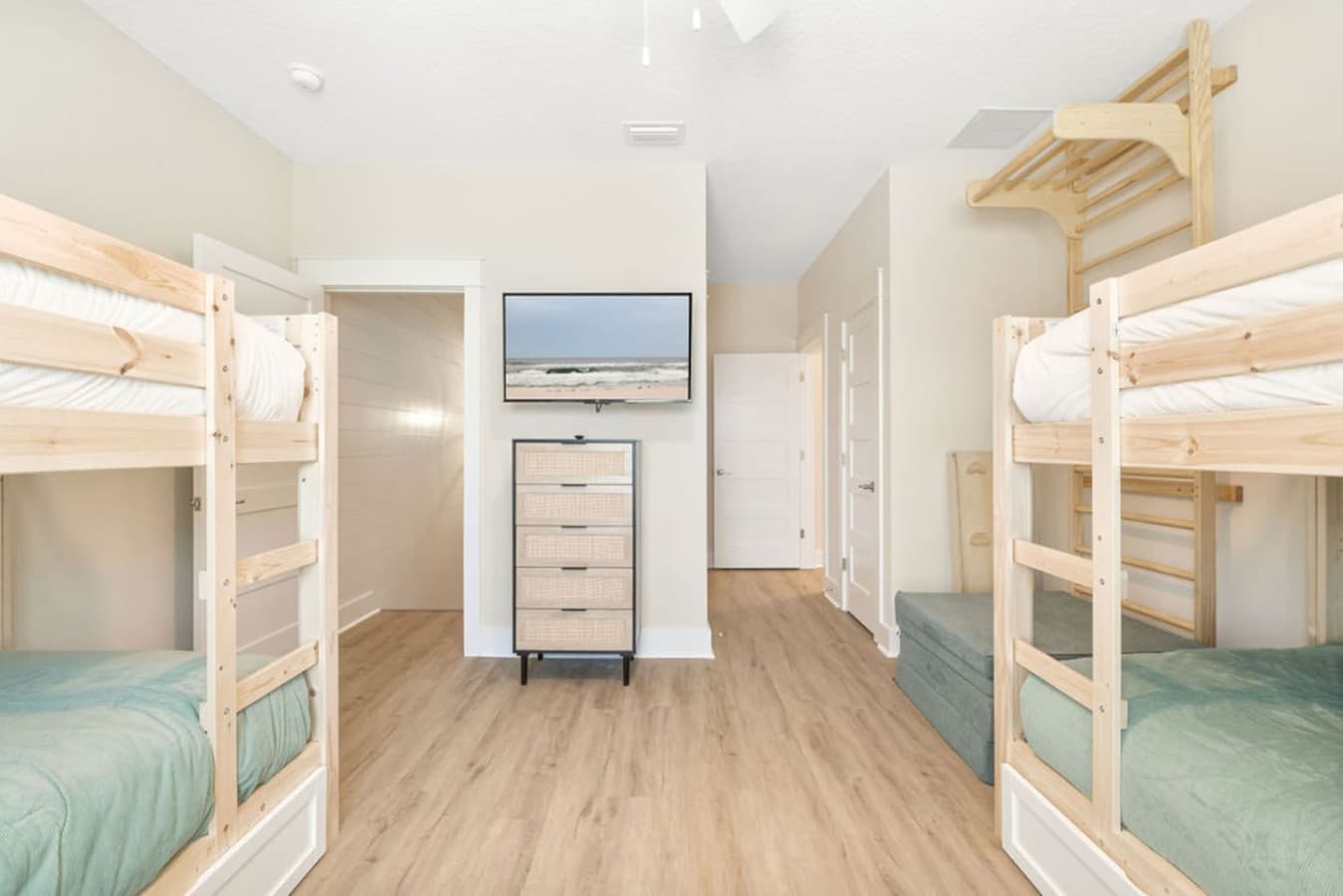 The bunk room can sleep six, with two additional beds as pull out trundles