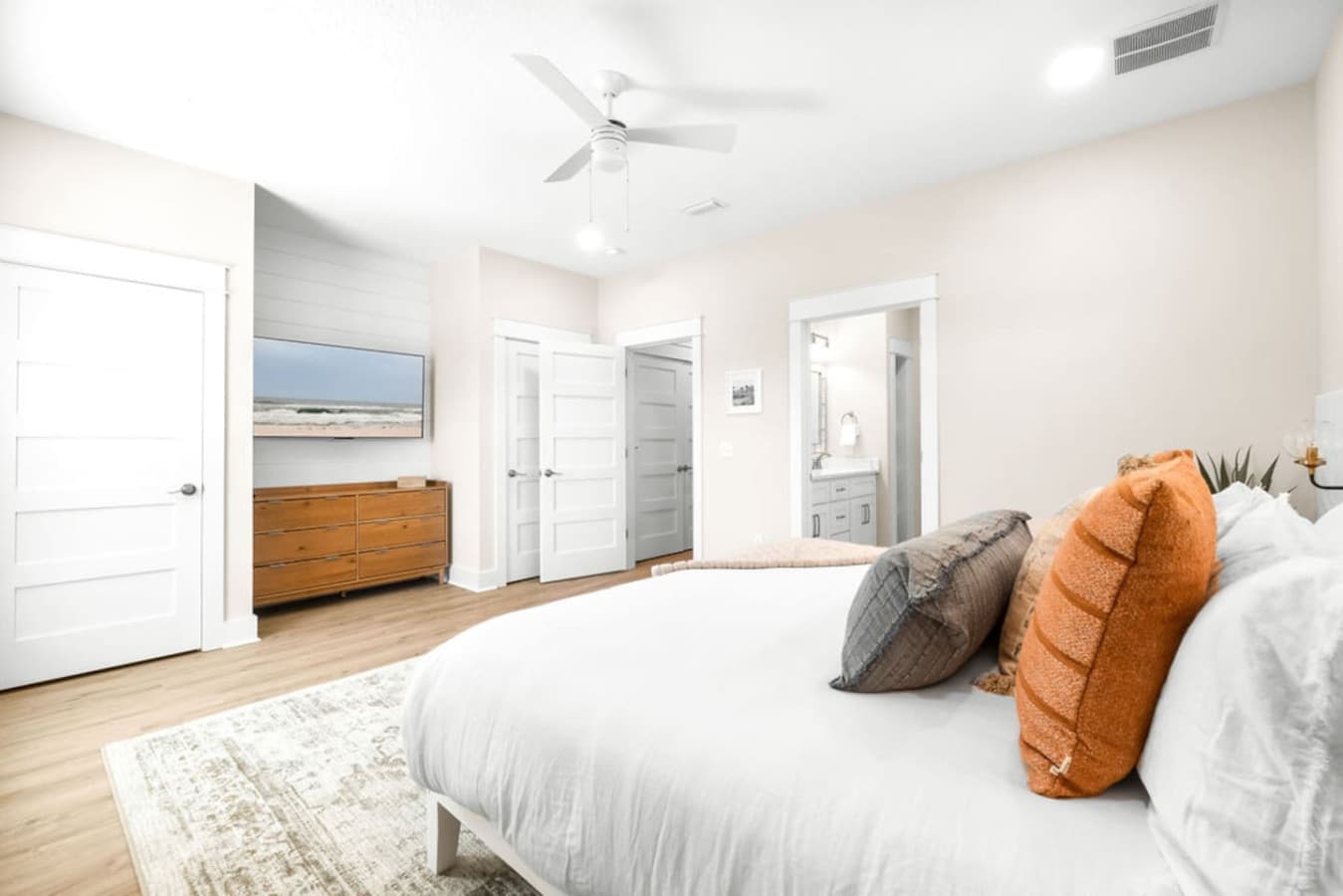 King Bedroom Upstairs with 65 inch smart TV