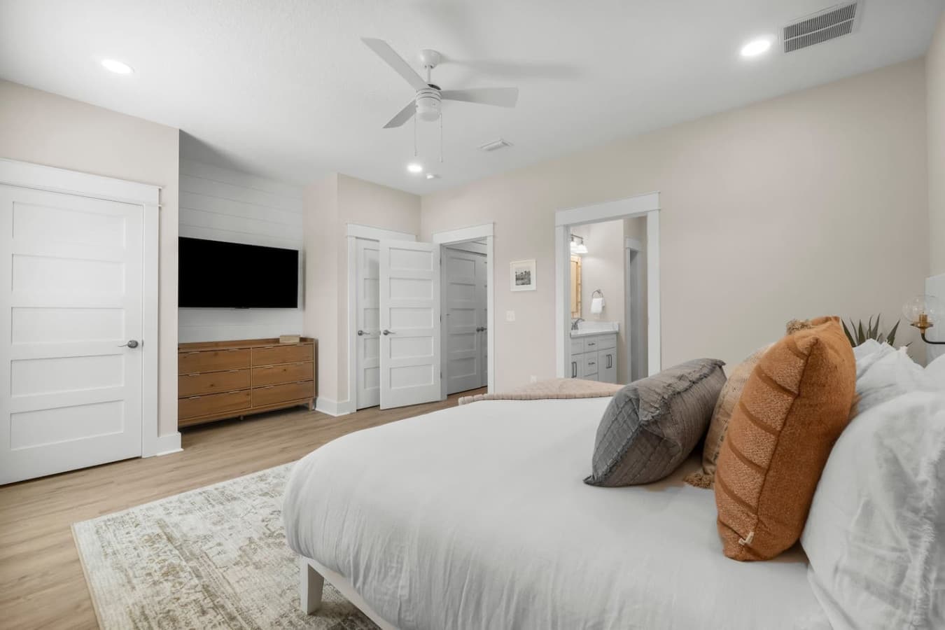 King Bedroom Upstairs with 65 inch smart TV