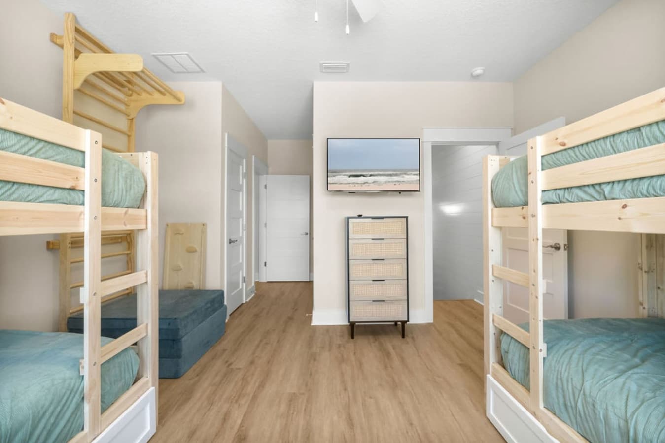 The bunk room can sleep six, with two additional beds as pull out trundles