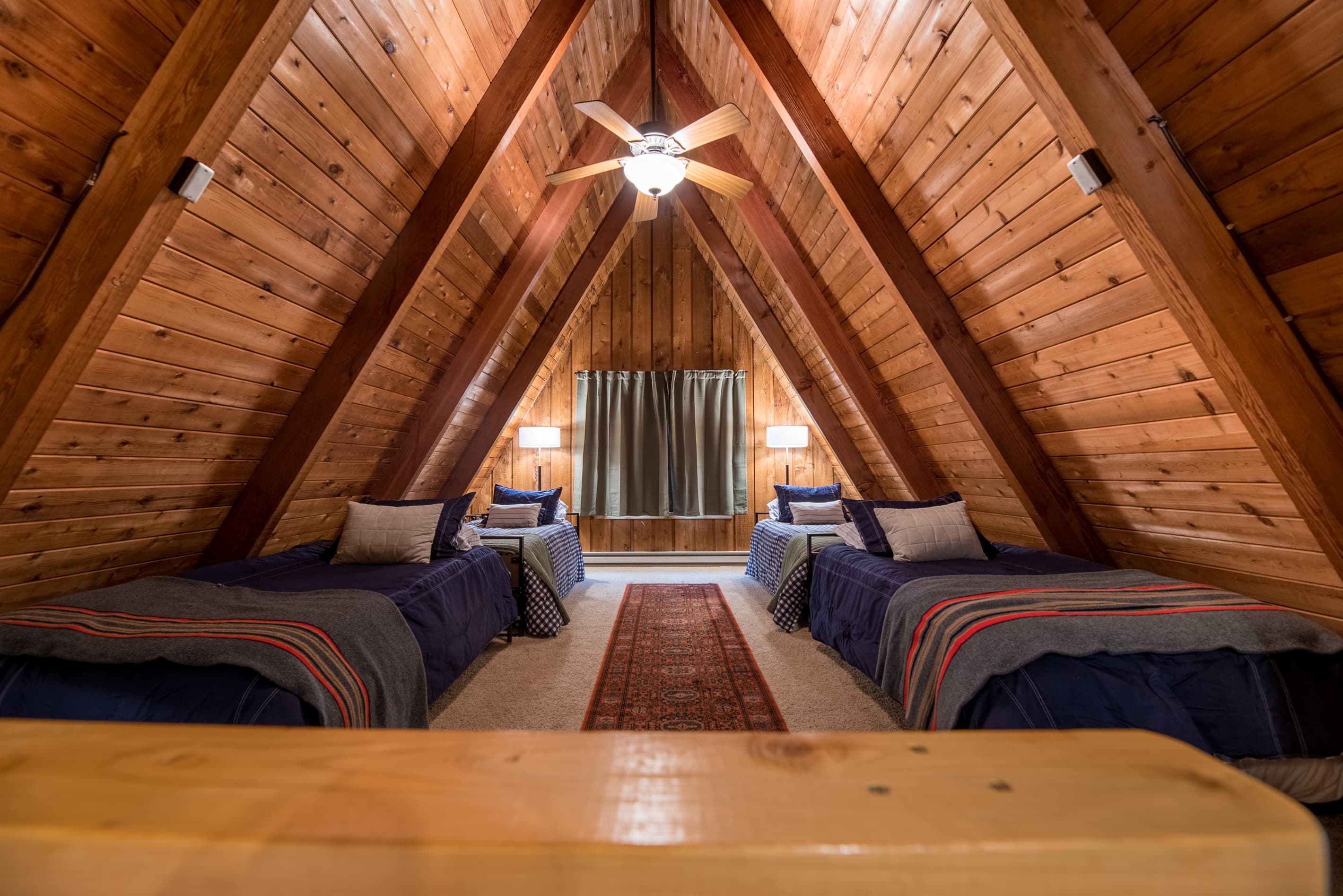 Can you imagine a more perfect setting for your kids/grandkids? The loft sleeps 8 with 4 twin trundle beds and a smart tv to wind down with a movie night.