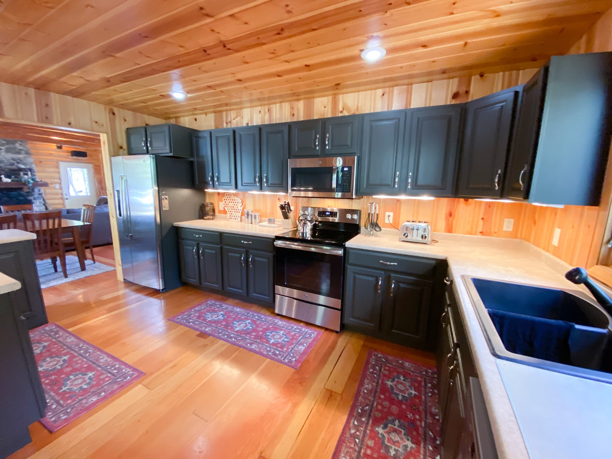 Fully equipped kitchen with new appliances to prepare all of your meals while at the cabin.