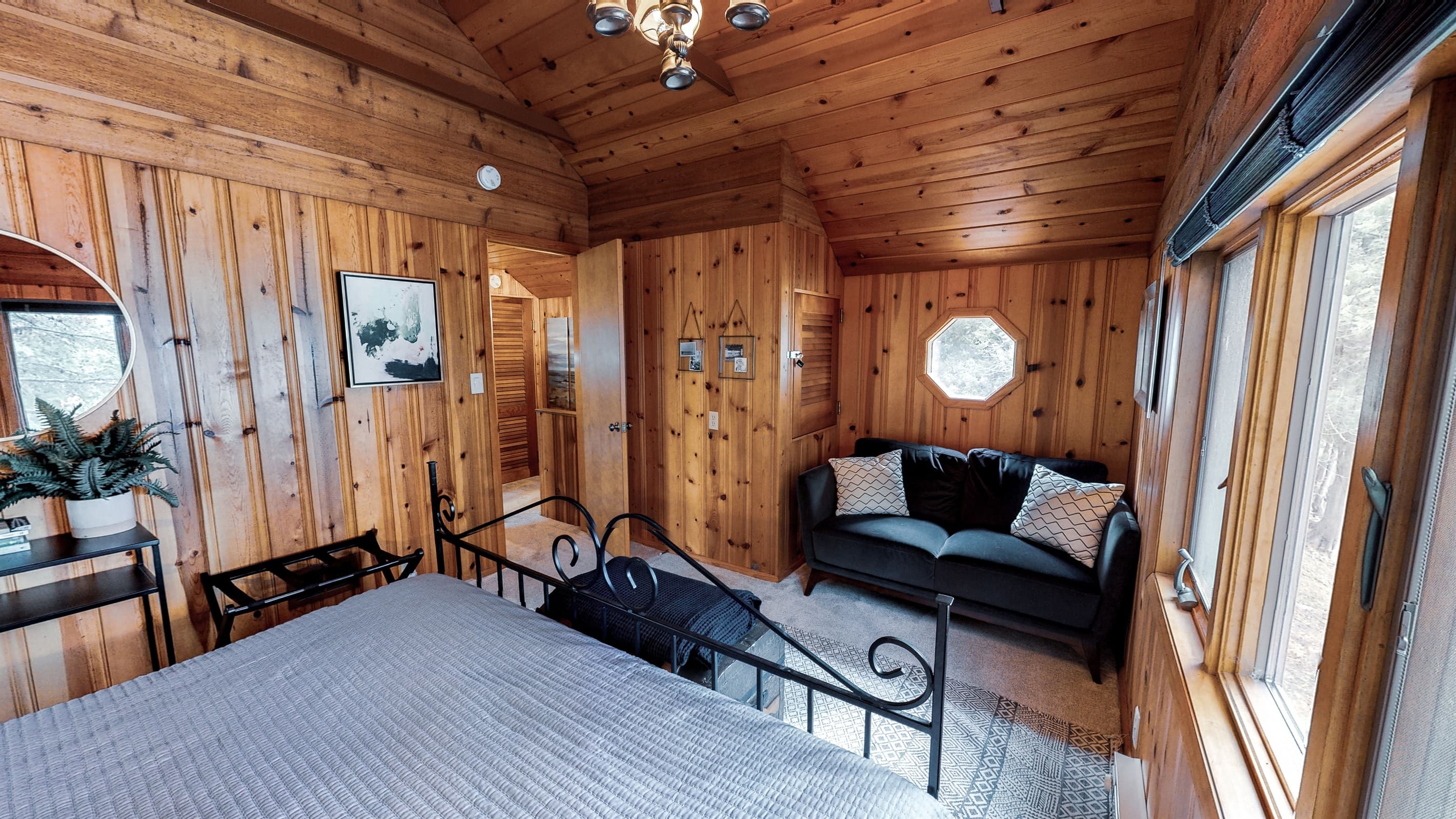 Another view of bedroom #3 where you'll feel like you're right on the water in aboat, port hole and all.