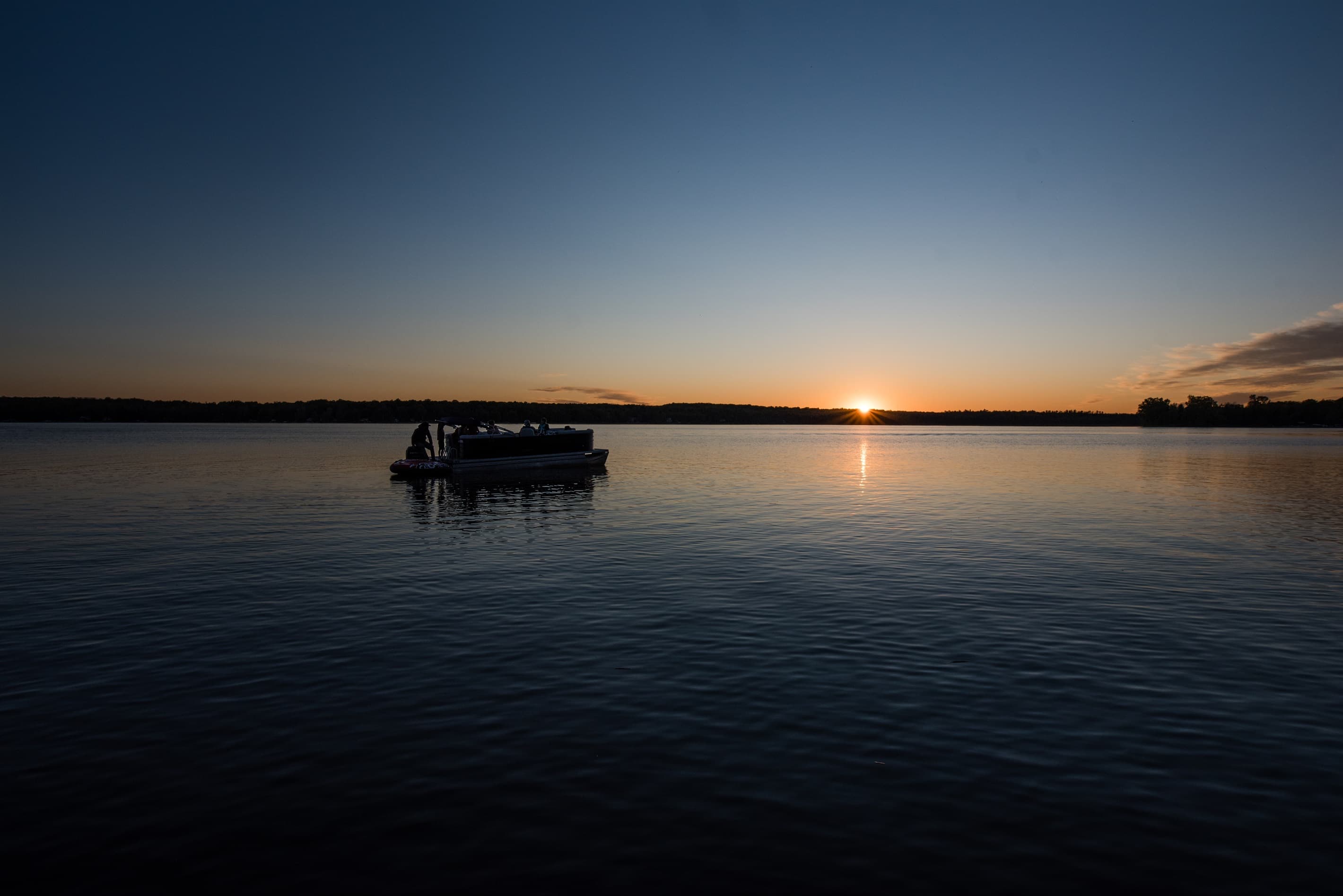 Rent the pontoon for sunset cocktail hour around the lake.