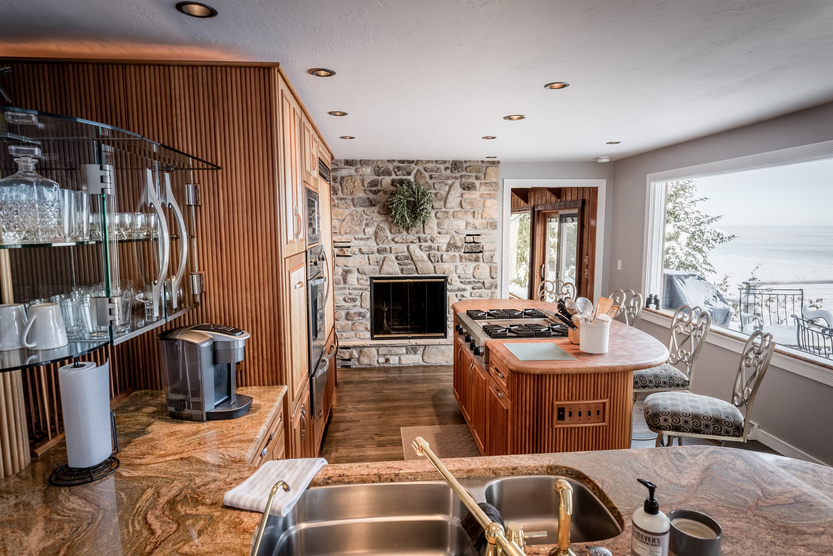 A fireplace in the kitchen? You bet there is.
