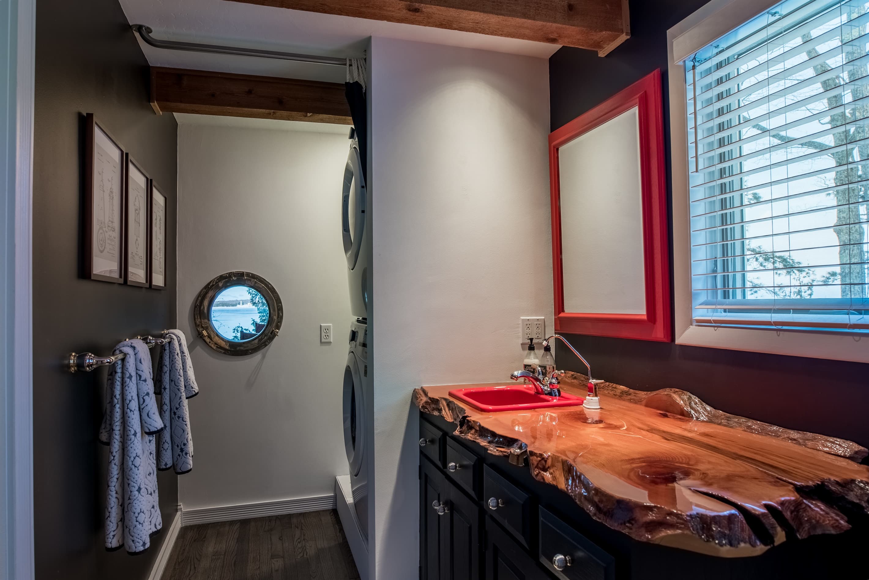 You'll find a full bathroom right off the guest room with a port hole view of the lighthouse!