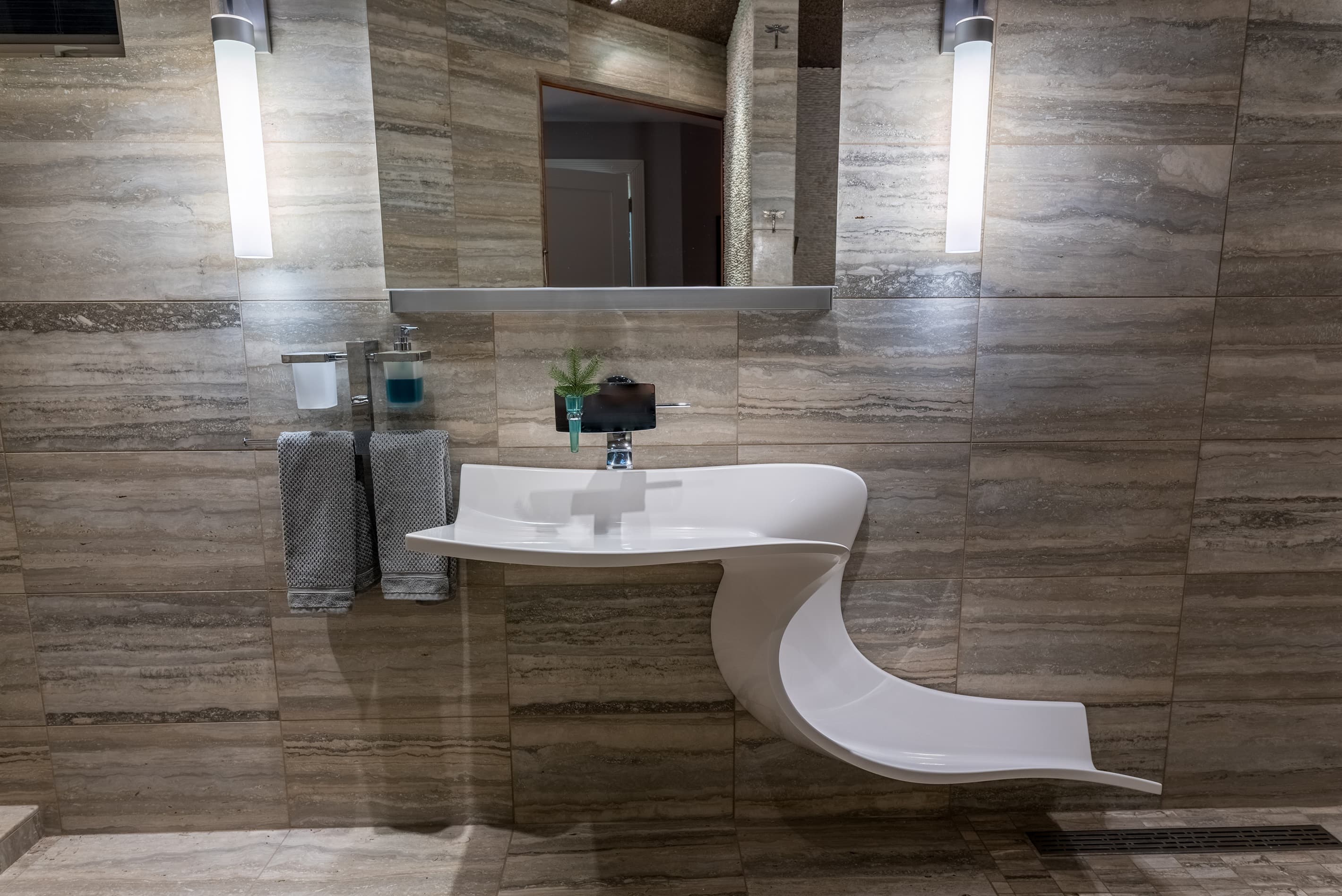 I promise you've never seen a sink this cool before! The water spills over to the floor.