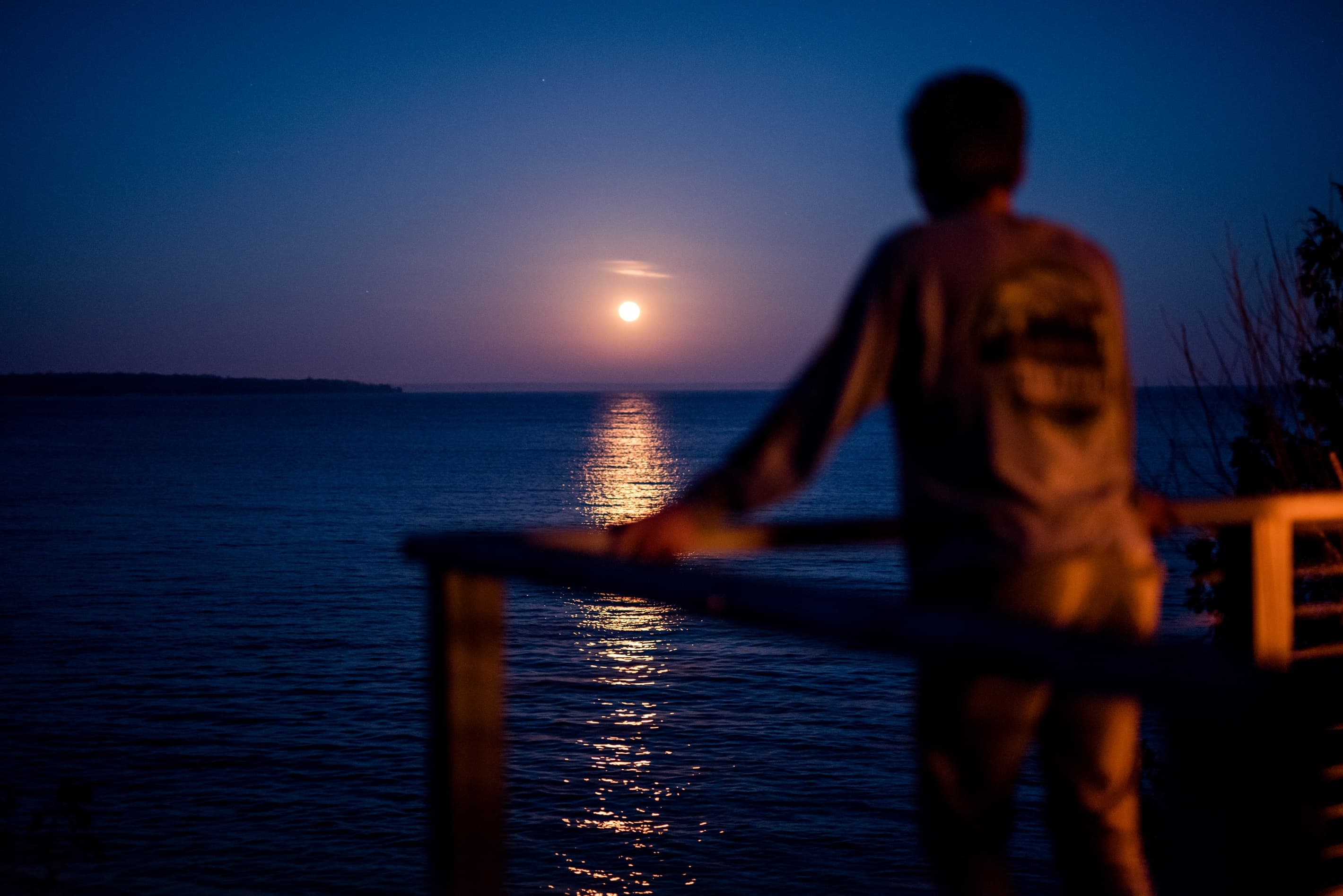 The moon rising over the lake, magical.