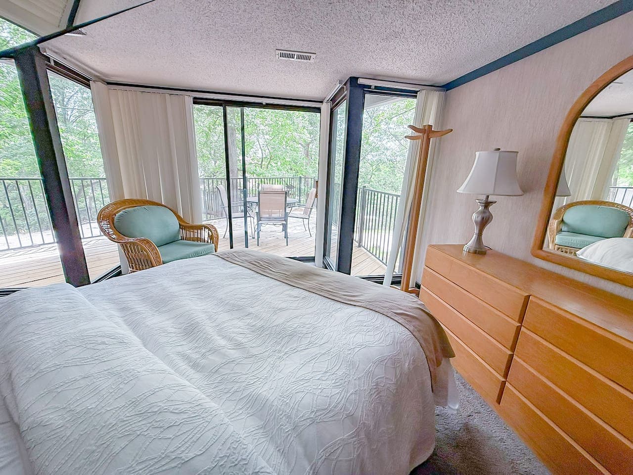 "Experience lakeside living from your bedroom! Step onto your private deck and soak in the serene beauty of the Lake of the Ozarks."
