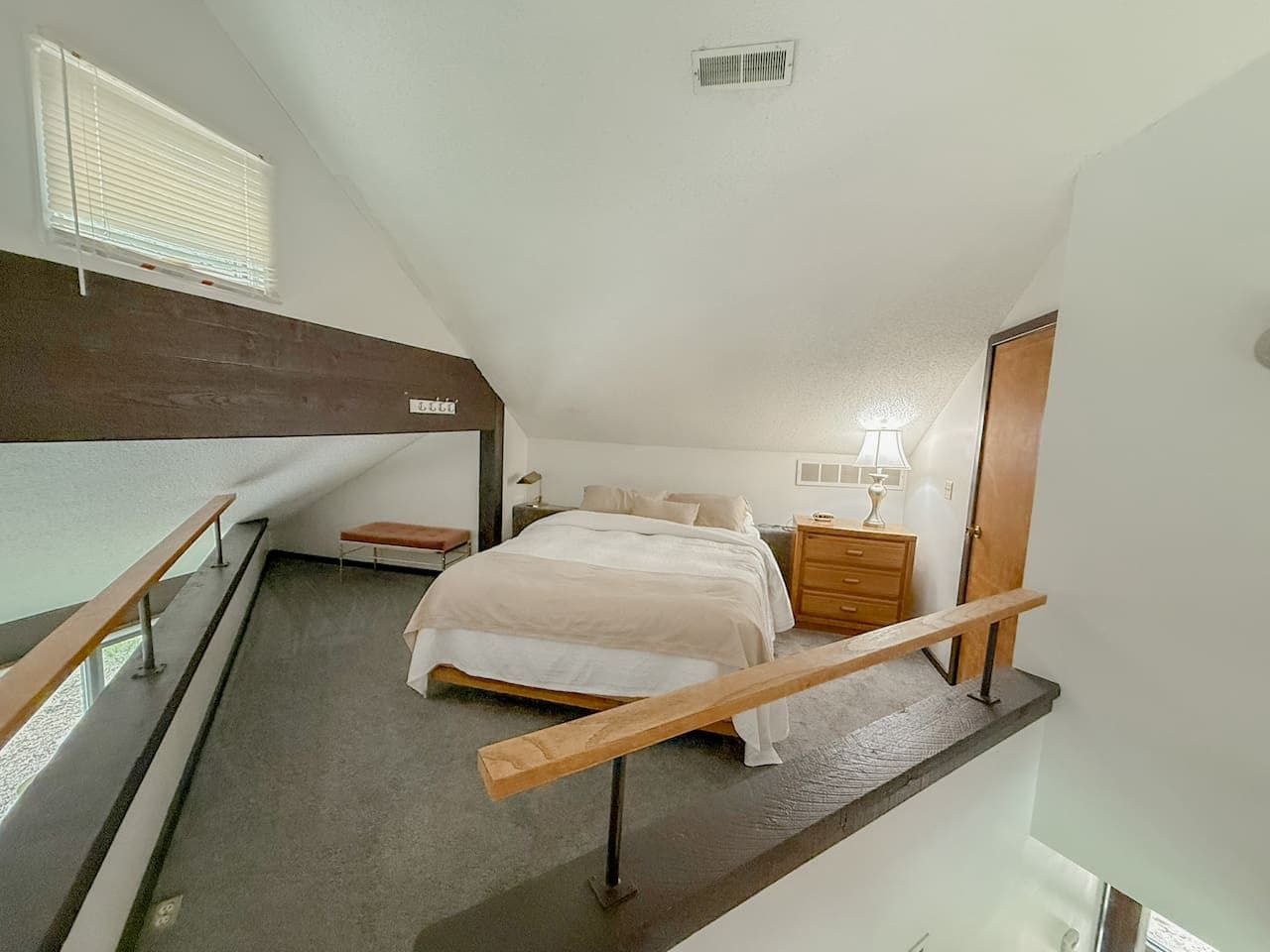 "Discover a unique sleeping experience in our comfortable loft bedroom, offering privacy and a cozy ambiance within the villa."
