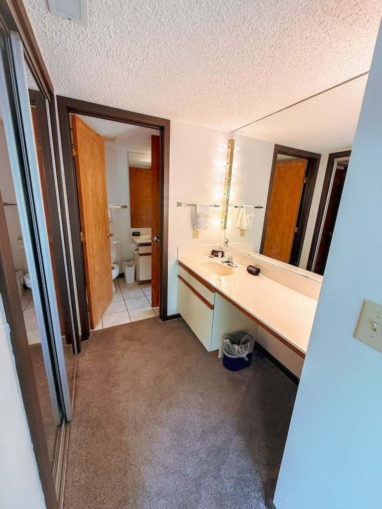 "One of our well-appointed bathrooms, featuring ample counter space and a convenient layout for your group."