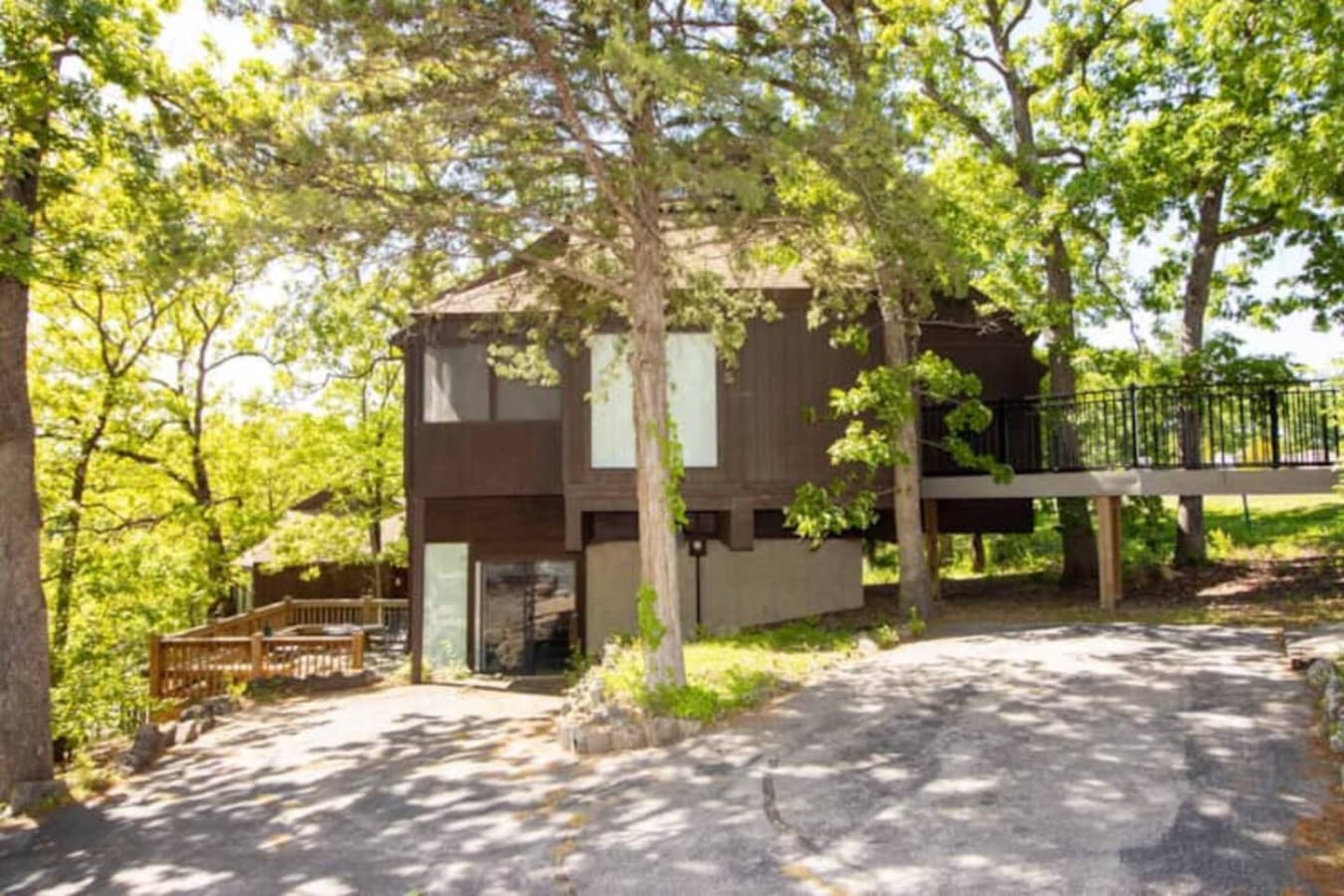 Perched on the hillside, Treetop Unit 51 blends comfort and nature just minutes from the lake and pool.