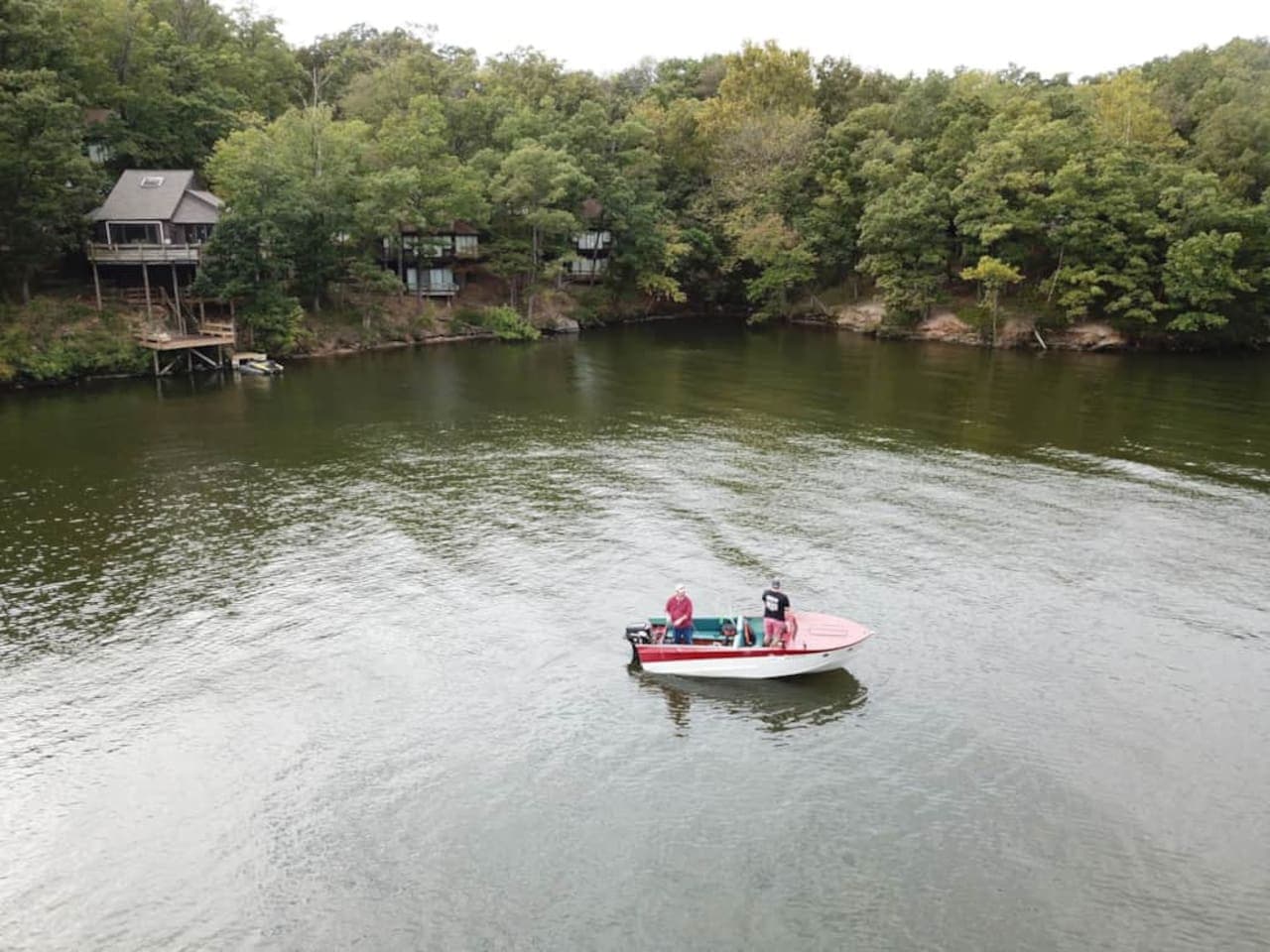 This serene lakefront property offers breathtaking water views and direct access to the tranquil lake, perfect for those seeking a peaceful escape. Enjoy the expansive outdoor space, ideal for relaxation and entertaining, with the calming presence of
