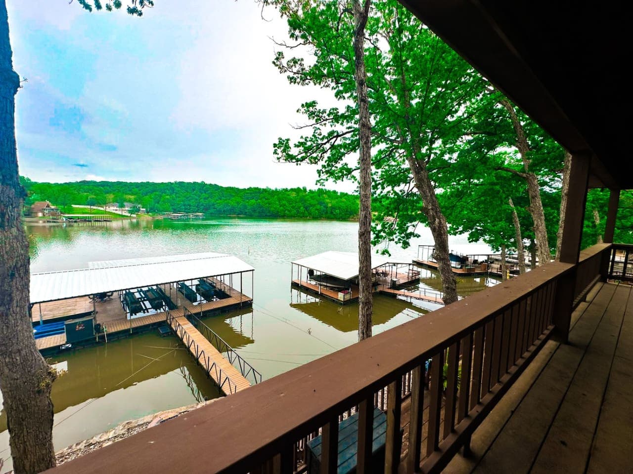 Enjoy panoramic lakefront views from your spacious private deck, the perfect spot for morning coffee or evening sunsets. Crafted with natural materials and designed for relaxation, this outdoor haven seamlessly blends comfort with the beauty of its s