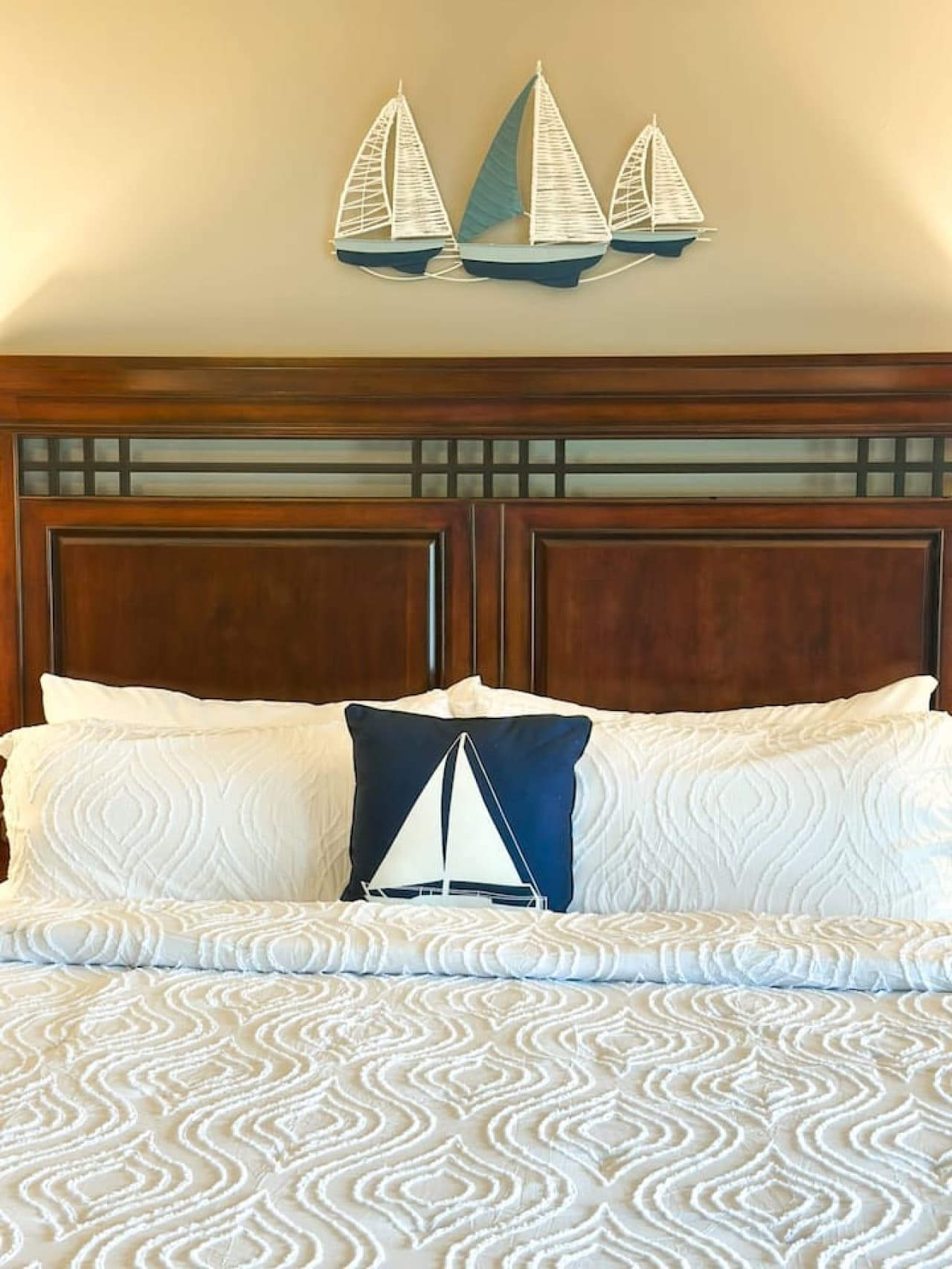 Drift off in lakefront luxury. Our serene master bedroom features nautical touches and a plush king bed. Your perfect escape after a day on the water