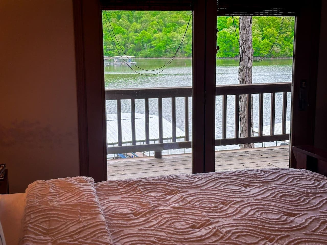 Enjoy morning coffee by the windows or step out onto the master bedroom patio for a breath of fresh lake air.